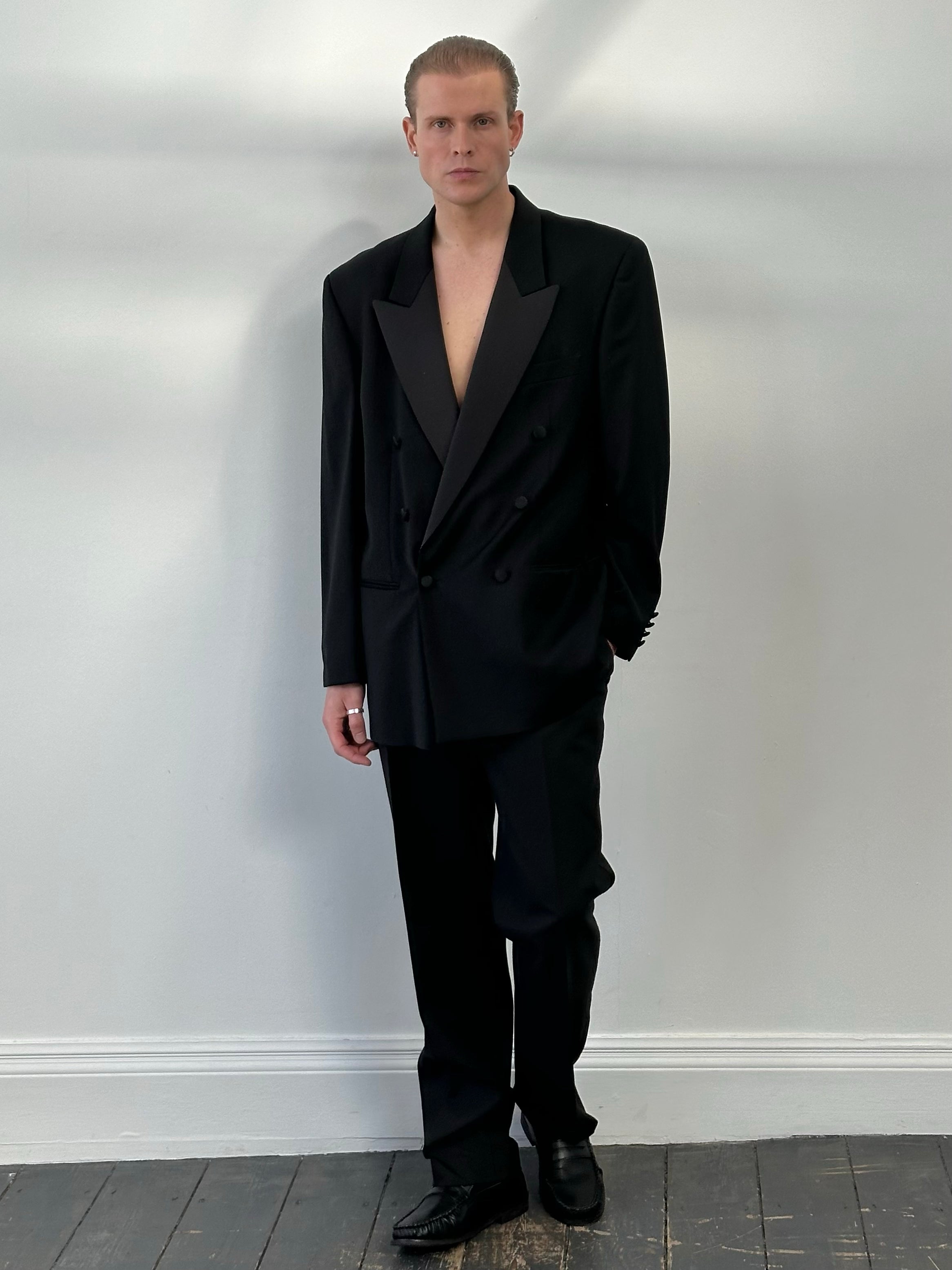 Pierre Cardin 1990s wool double-breasted tuxedo suit, size 46R, featuring classic lapels and tailored fit, displayed on a mannequin.