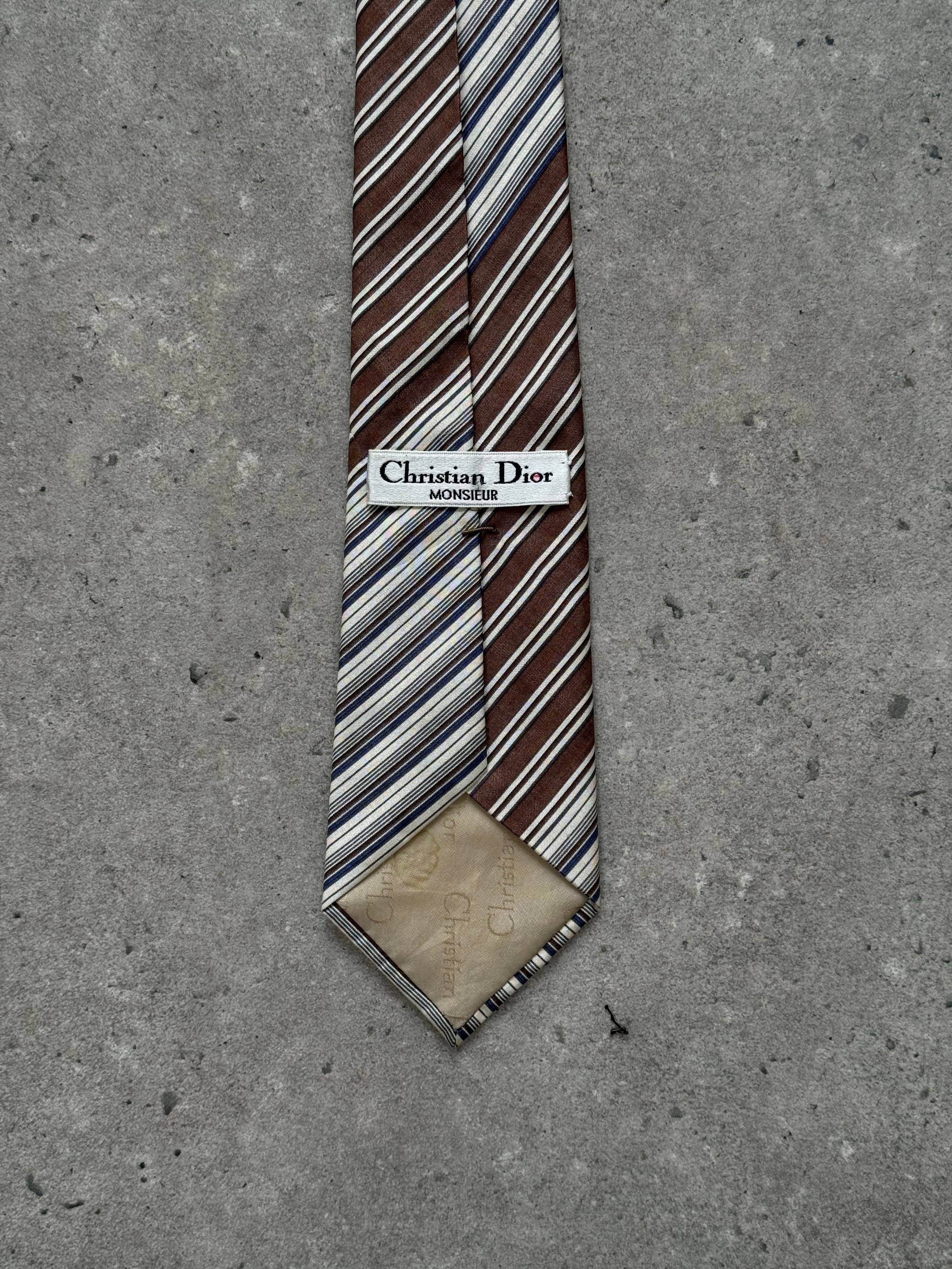Christian Dior Monsieur 1990s silk striped tie, elegant men's accessory with blue and white pattern, made of high-quality silk fabric.