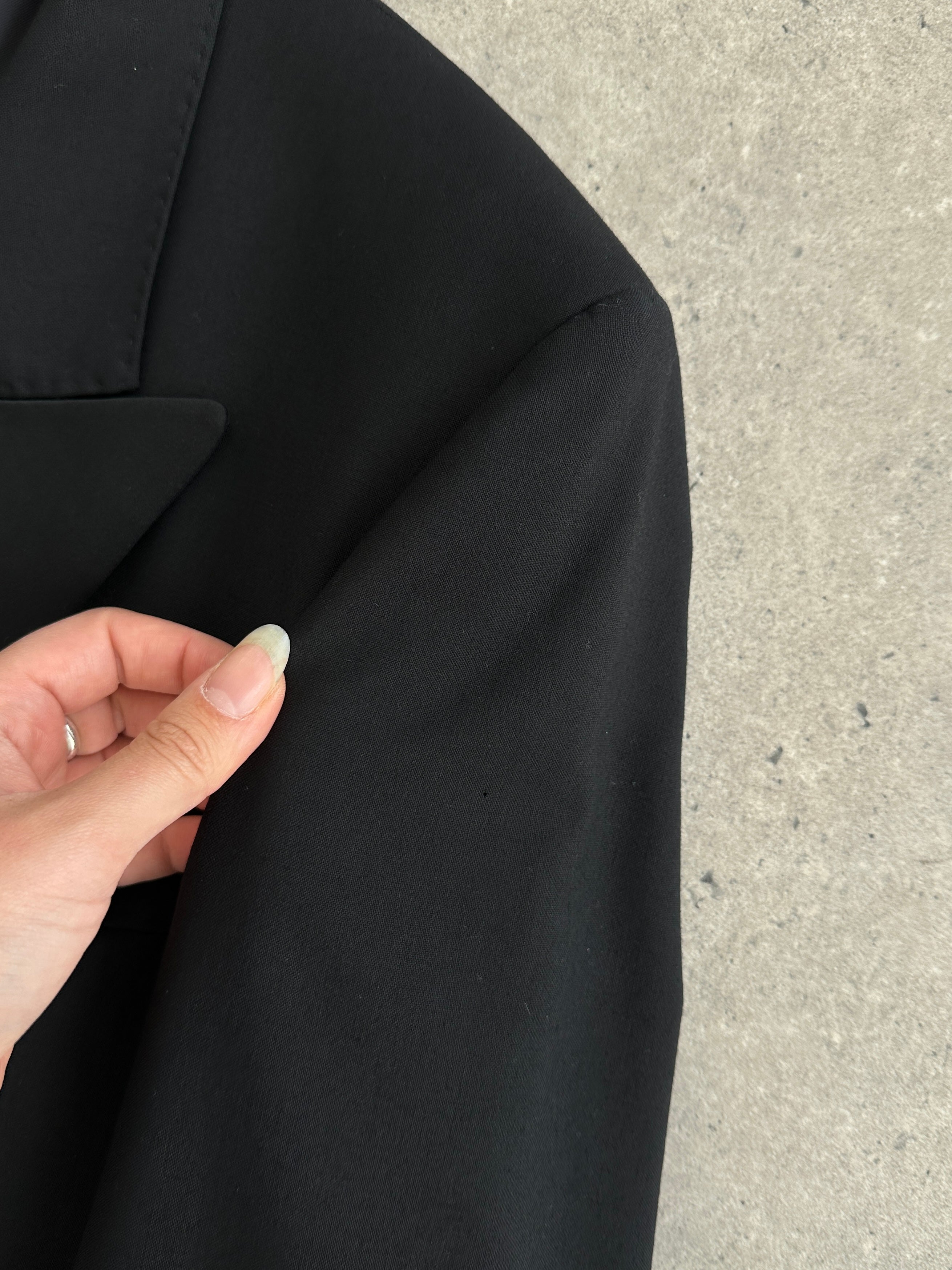 Jaeger black double-breasted wool tuxedo suit, size 42R/W28, tailored fit with classic lapels and sleek design.