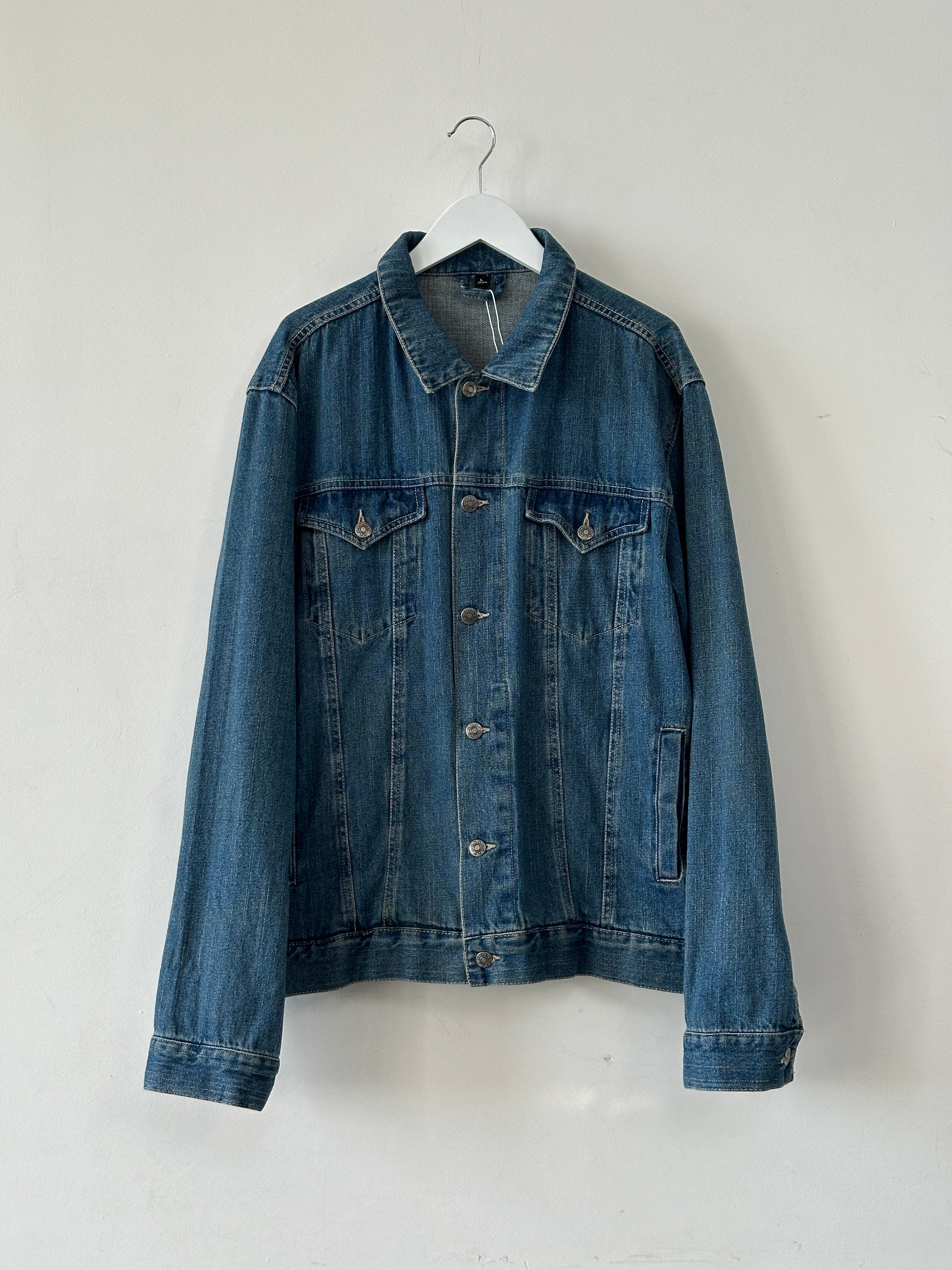 Vintage pure cotton denim jacket in XL size, showcasing classic style and durable fabric with button closures and chest pockets.