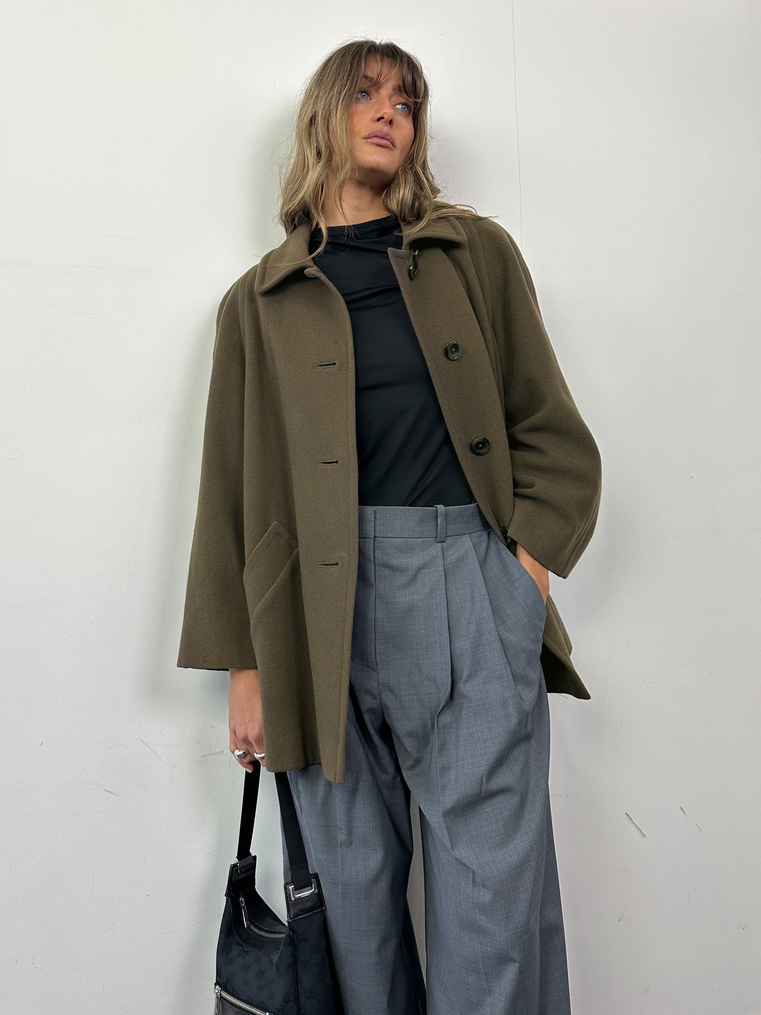 Aquascutum pure new wool coat in size M, stylish and warm outerwear with classic tailored design, shown in the image.