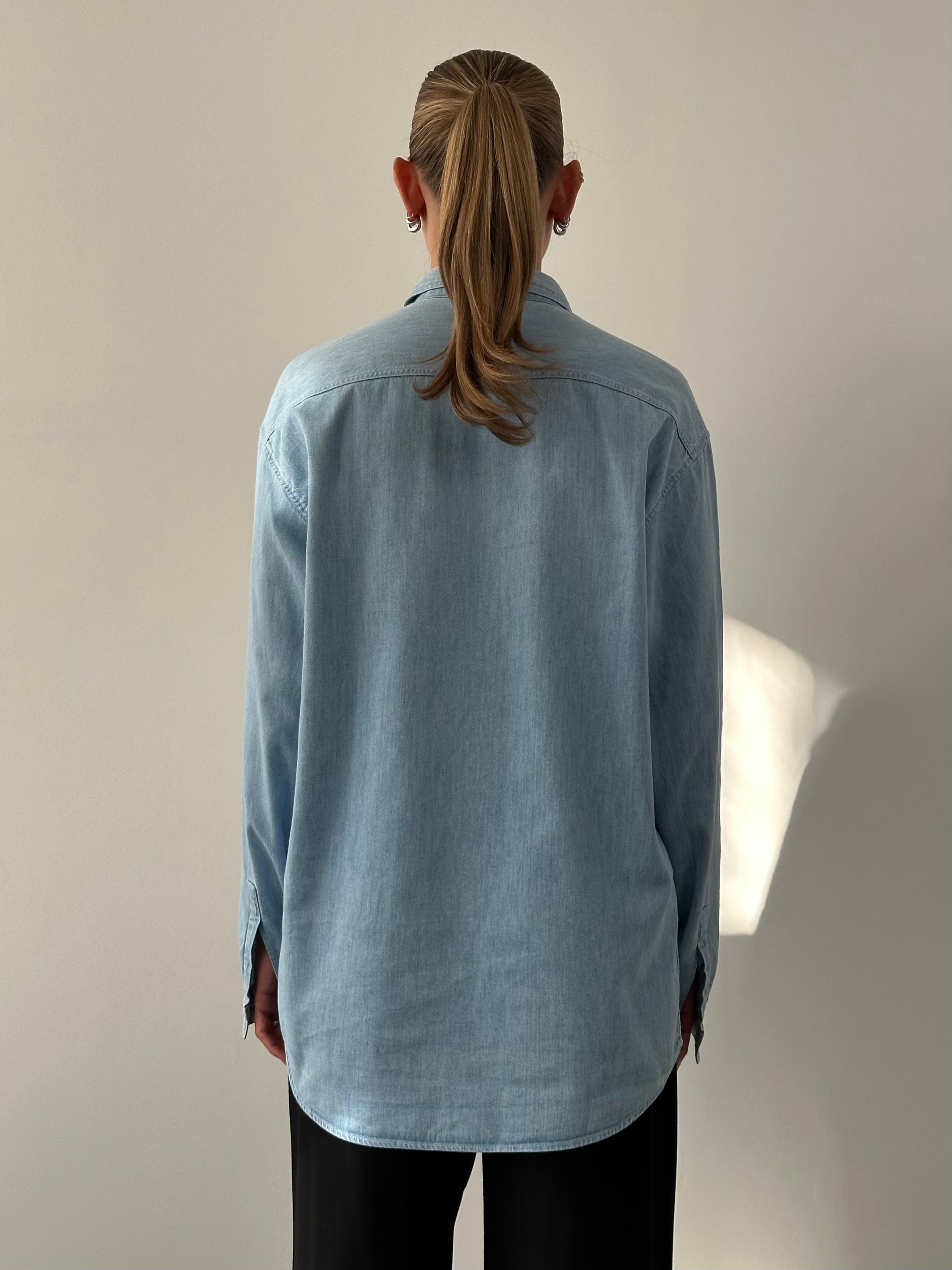 Armani Jeans pure cotton denim logo shirt in size XL, featuring a classic button-up design with embroidered logo on the chest.
