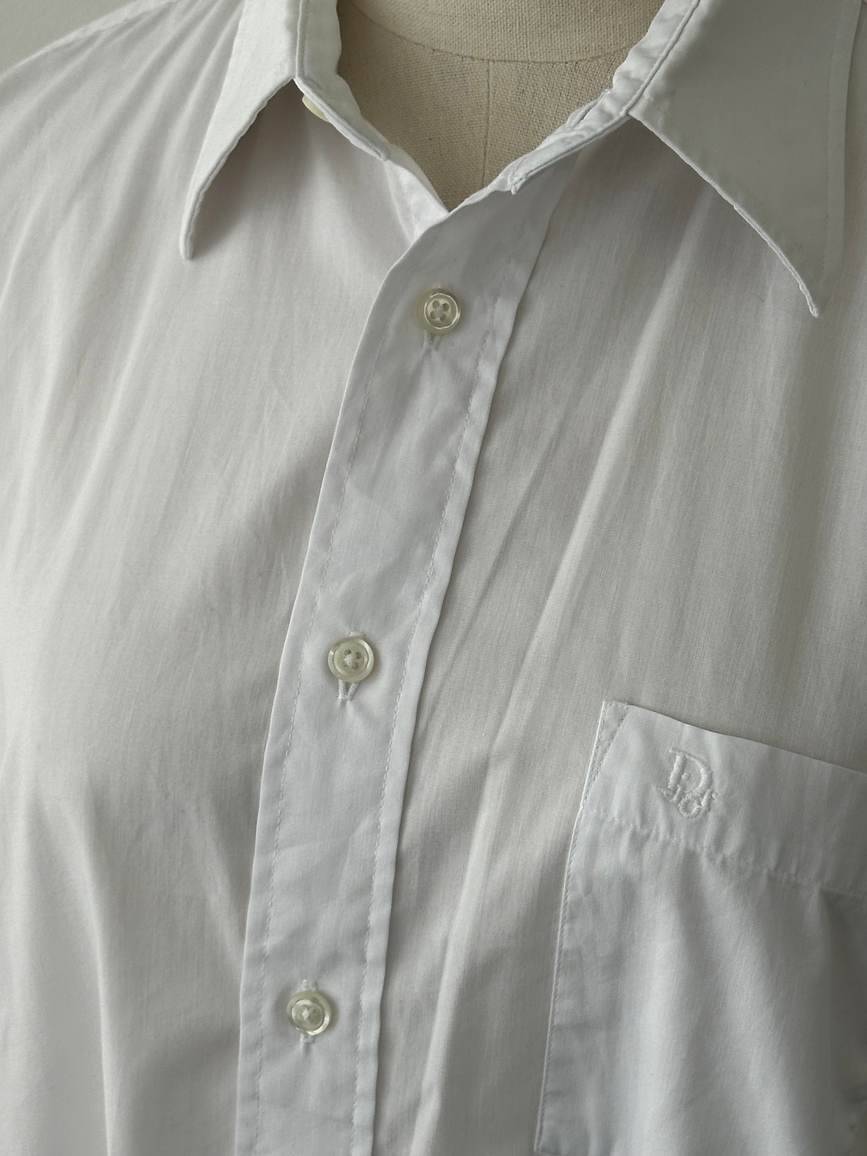 Christian Dior 1990s cotton logo shirt in size M, featuring classic Dior branding and a casual, stylish fit.