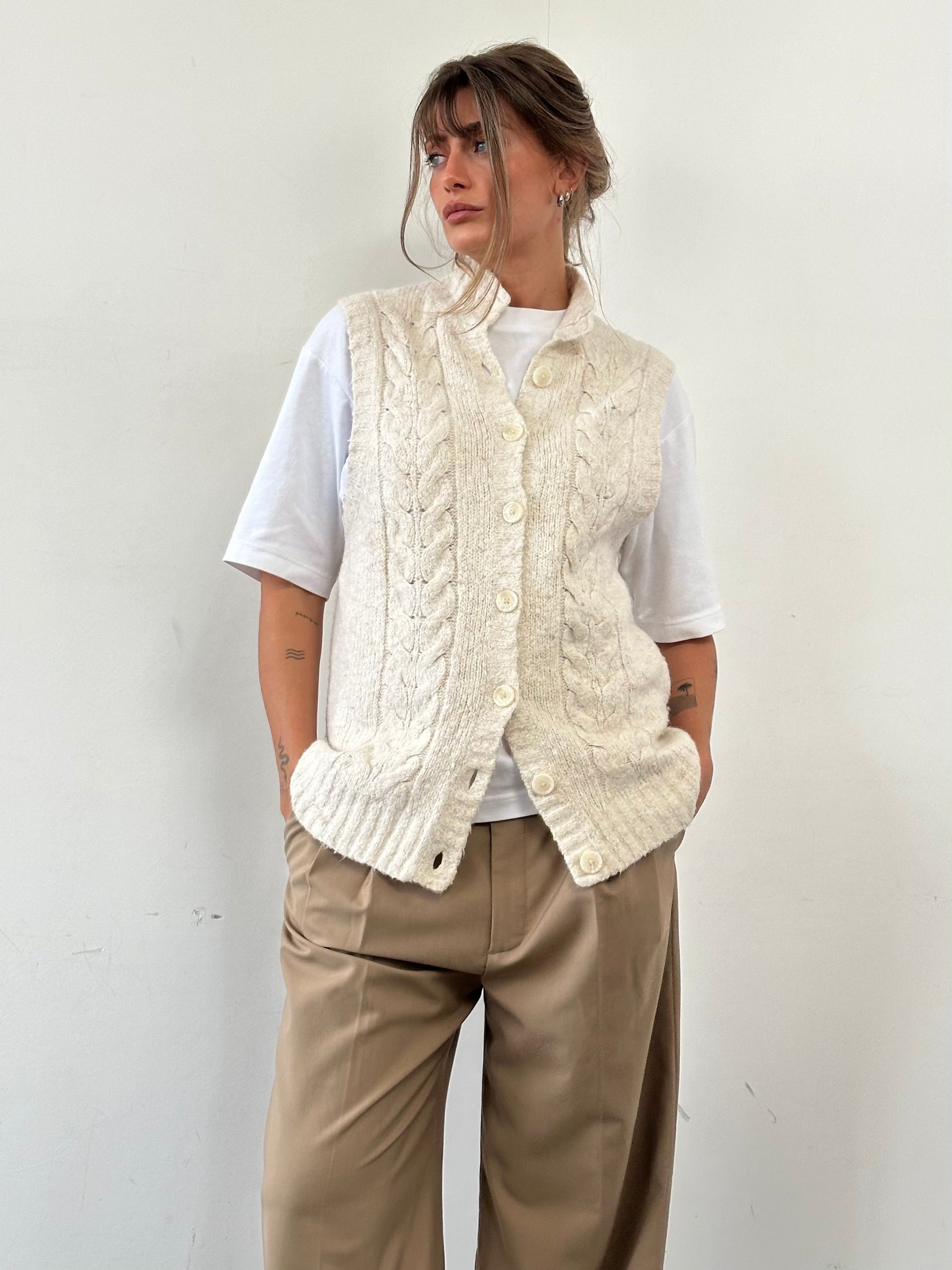 L.L.Bean wool sleeveless knitted cardigan in size large, beige color, displayed on a hanger.