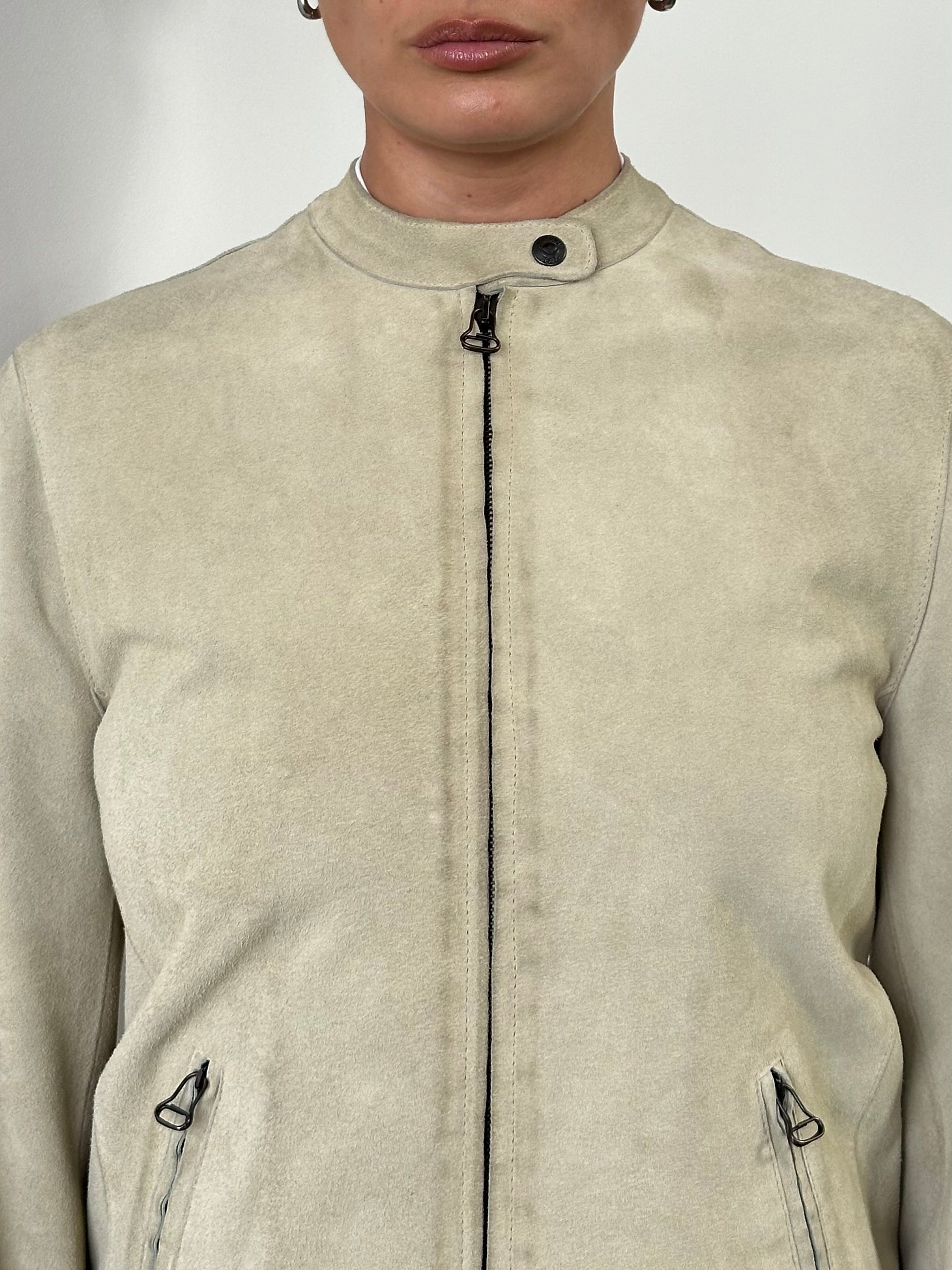 Armani Jeans fitted suede jacket in XS/S, shown in a natural pose, highlighting the soft suede material and tailored fit.
