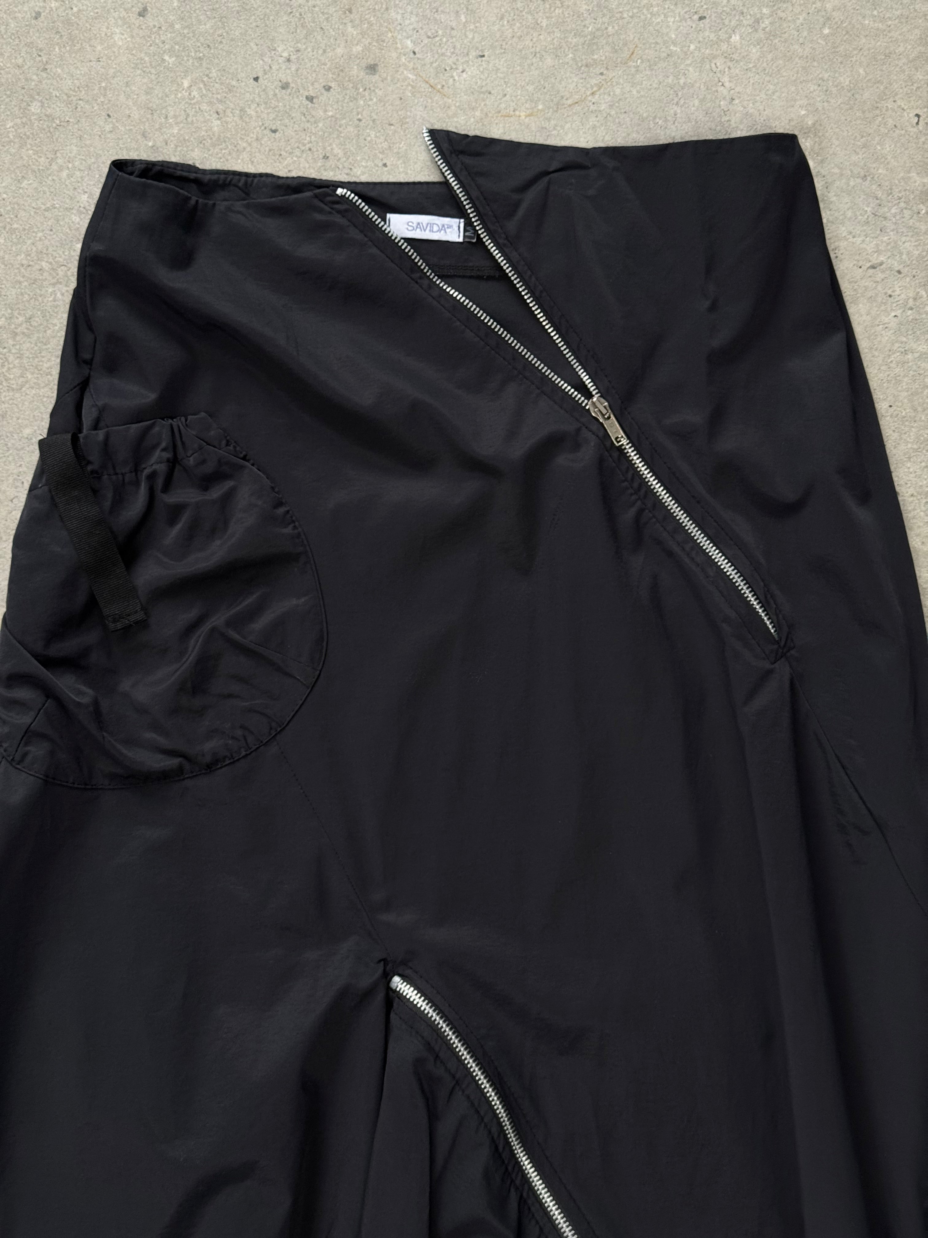 Vintage 1990s cotton ruffle skirt with multiple zippers and waist size W28, showcasing a retro style and textured fabric.