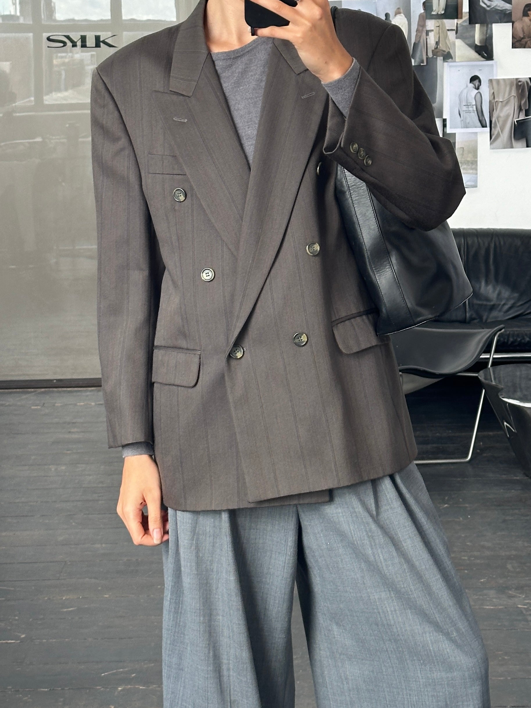 Pierre Balmain 1980s double-breasted wool blazer in size 40S/L, featuring classic tailoring and structured lapels.