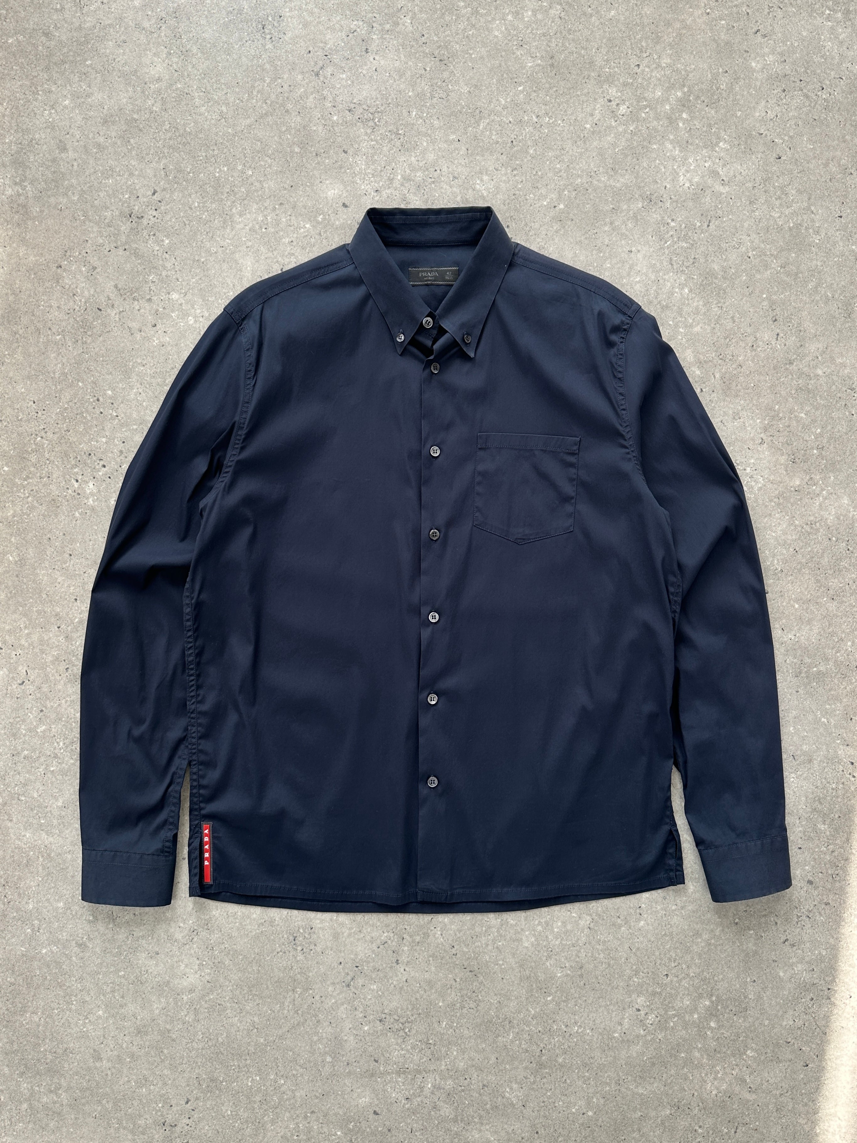 Prada 2000s cotton logo shirt in size M, featuring classic design with Prada branding and a comfortable fit.