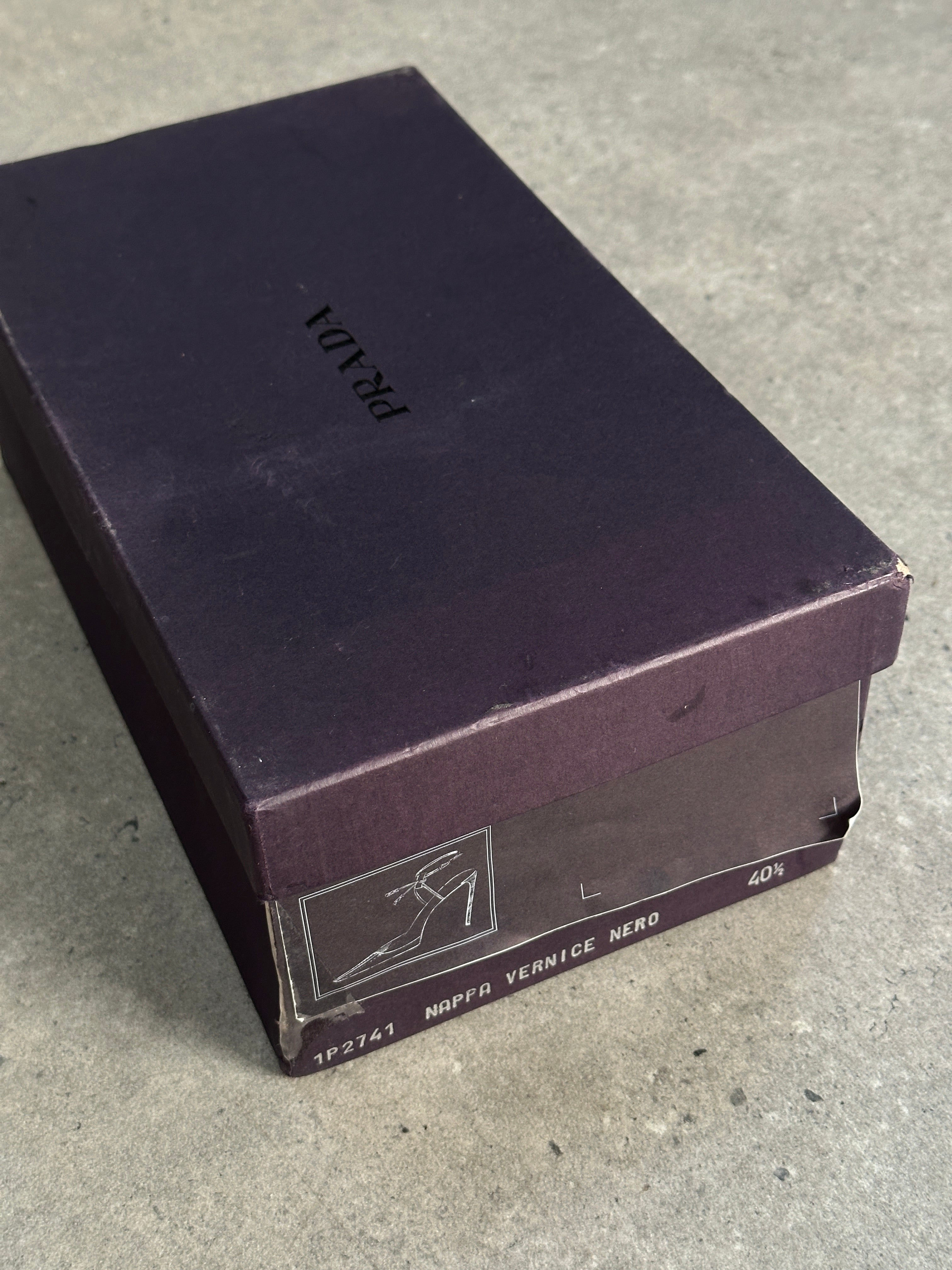 Prada pointed toe high heels in black leather, UK 7.5, EUR 40.5, stylish and elegant footwear for formal occasions.