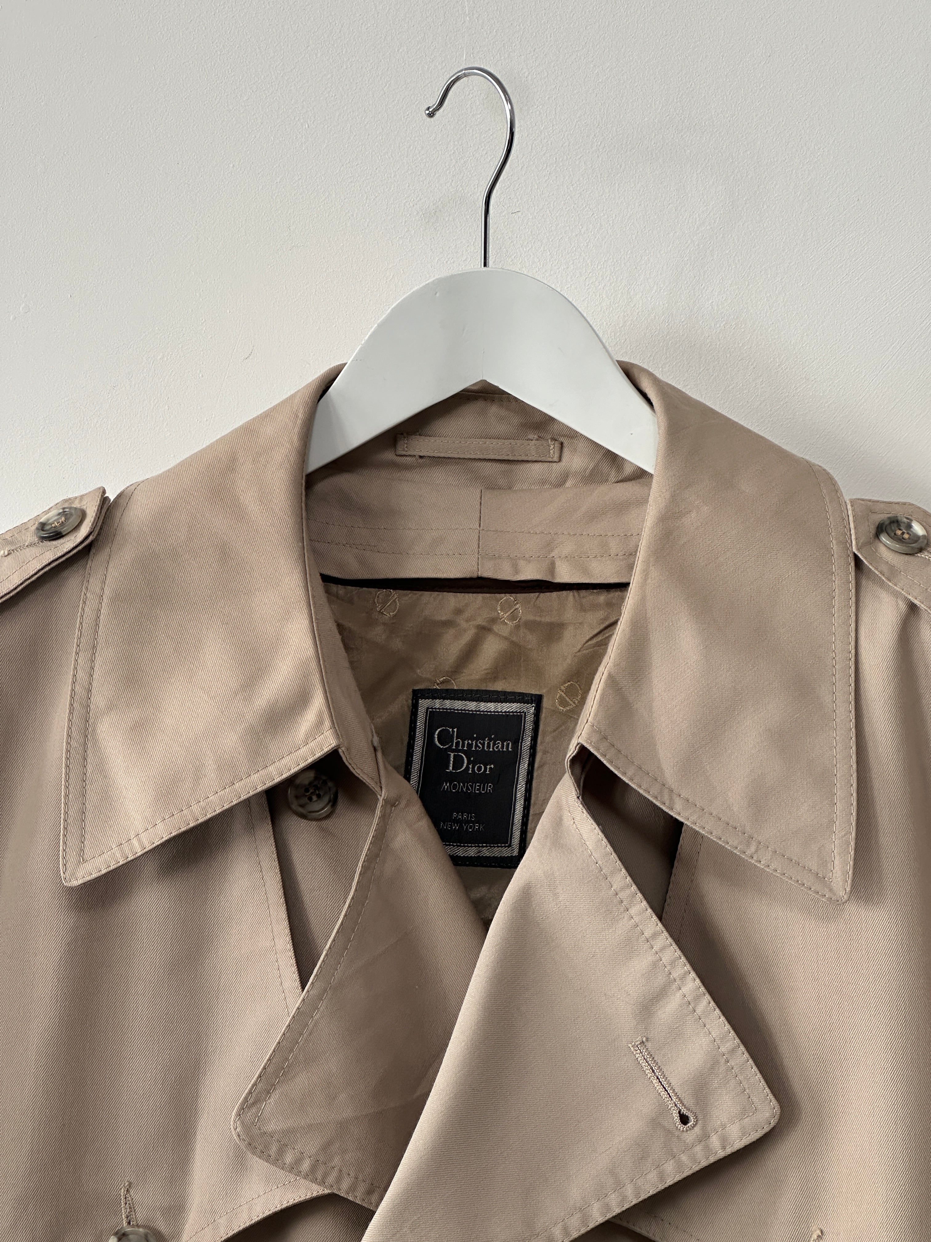 Christian Dior double-breasted trench coat in XL/XXL size, beige color, tailored fit, with classic collar and button details.