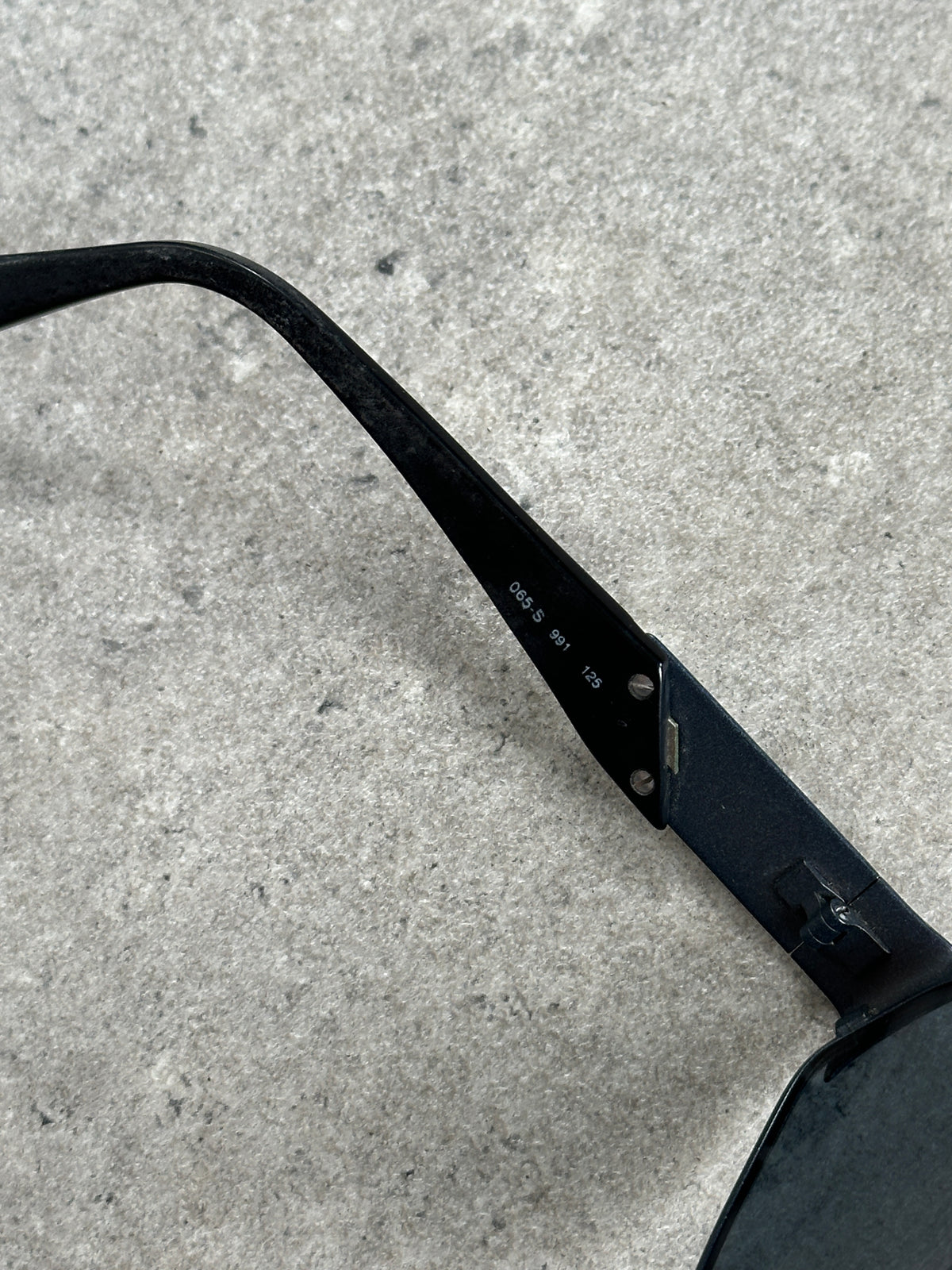 Emporio Armani 1990s oval logo sunglasses with dark lenses and black frame, stylish and iconic eyewear design.