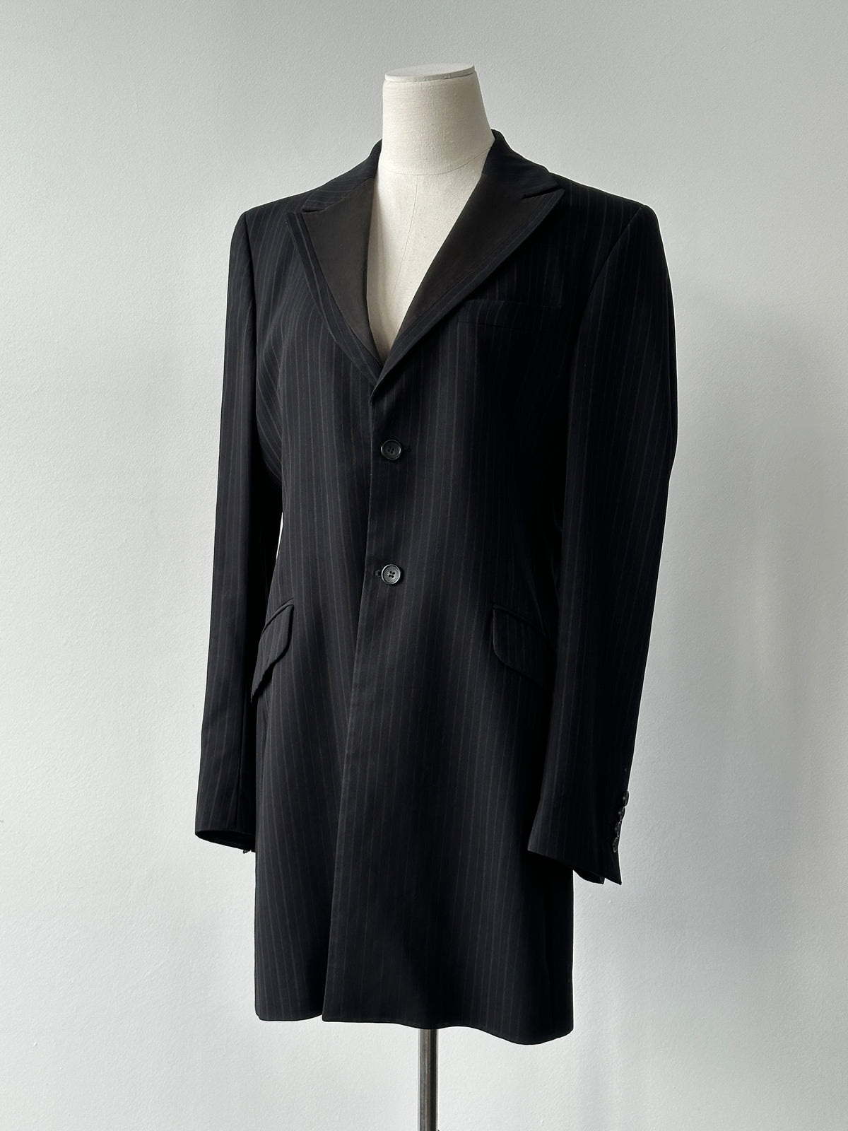Dolce & Gabbana 1990s wool striped tuxedo blazer, size L, featuring classic fit and bold vertical stripe pattern.