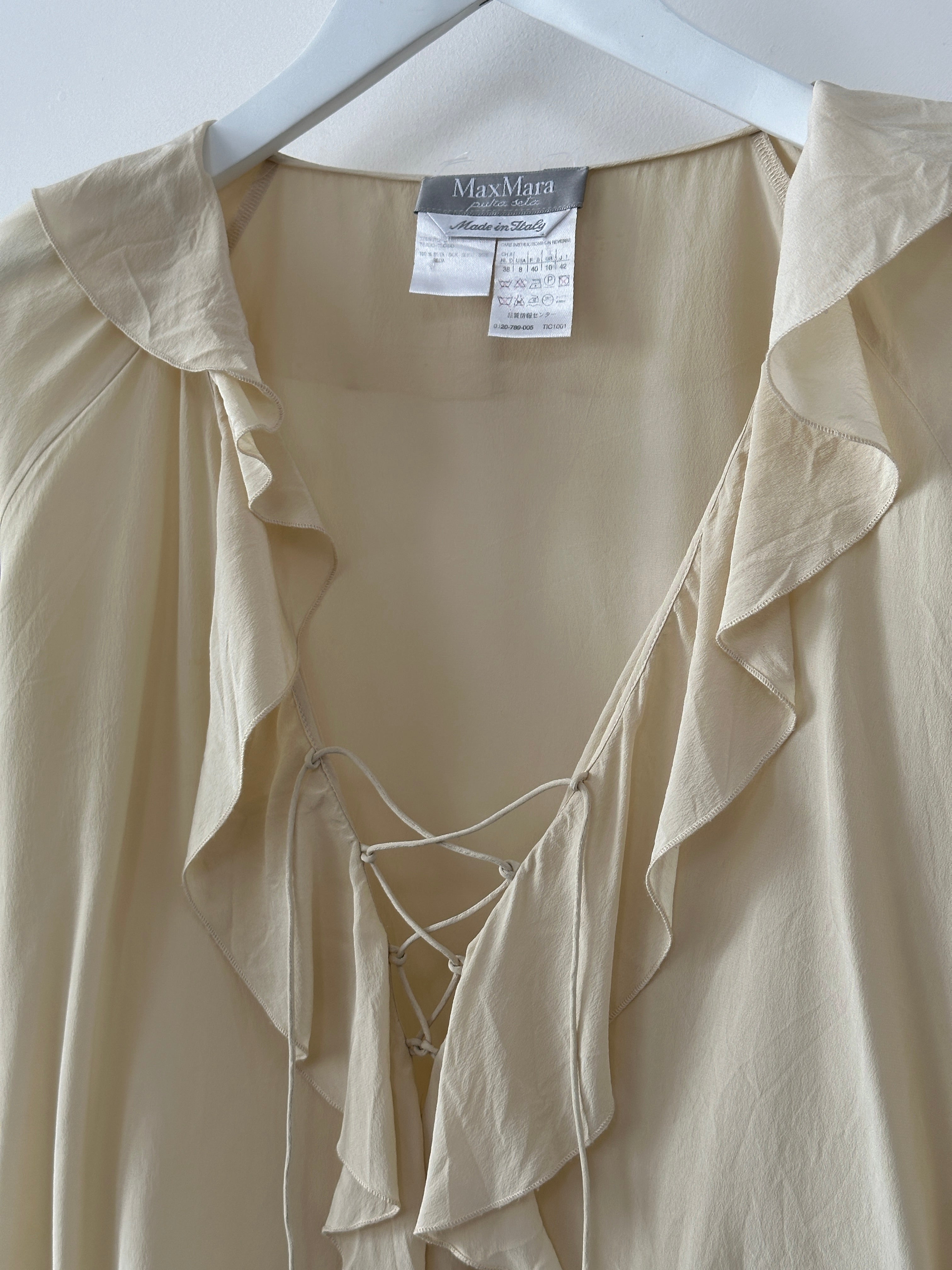 Max Mara pure silk ruffle tie front blouse in size S/M, featuring elegant ruffle details and a sophisticated shirt design.