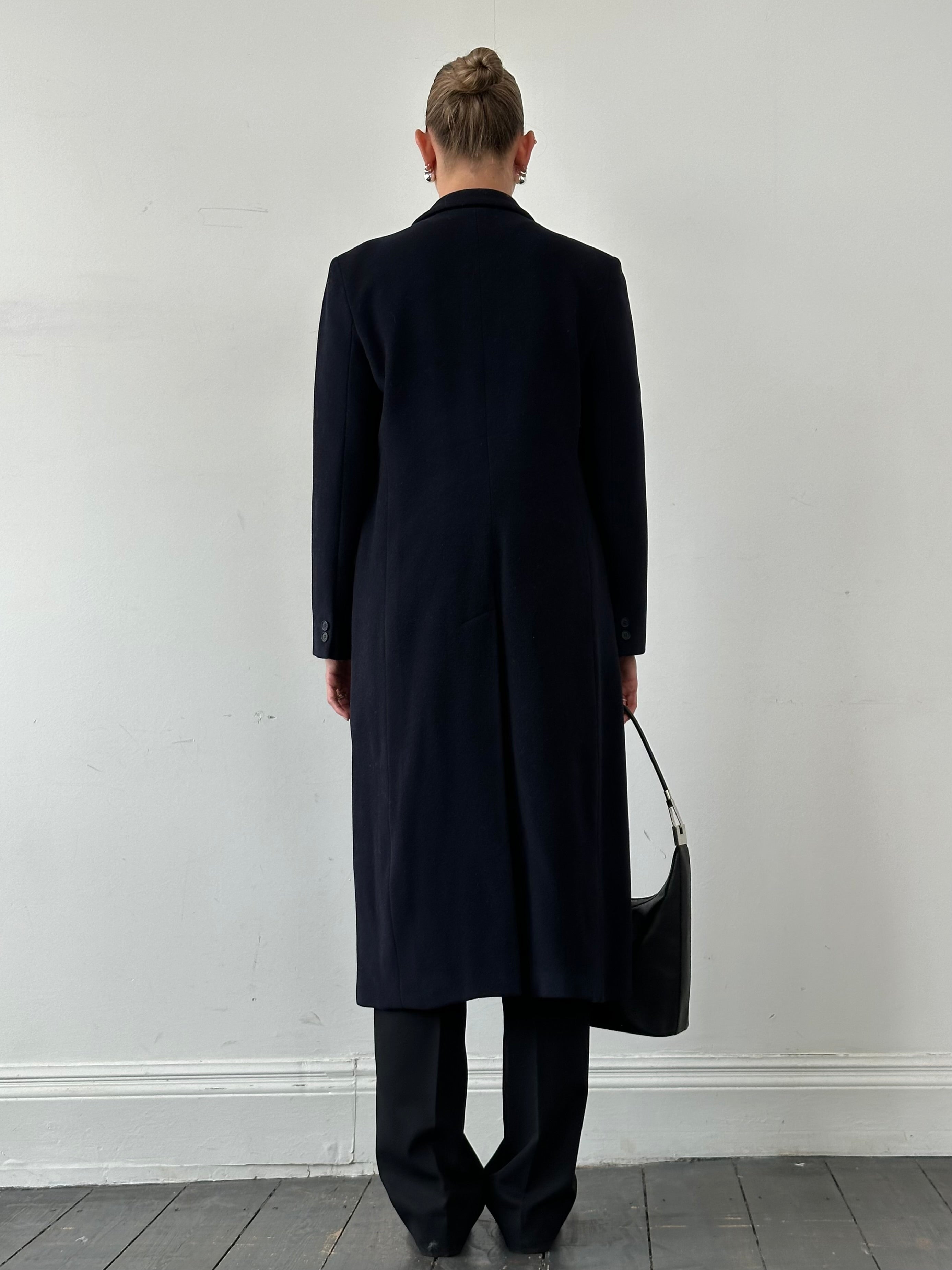 Emporio Armani pure wool single-breasted coat in size M, tailored fit with classic lapel, displayed on a hanger.