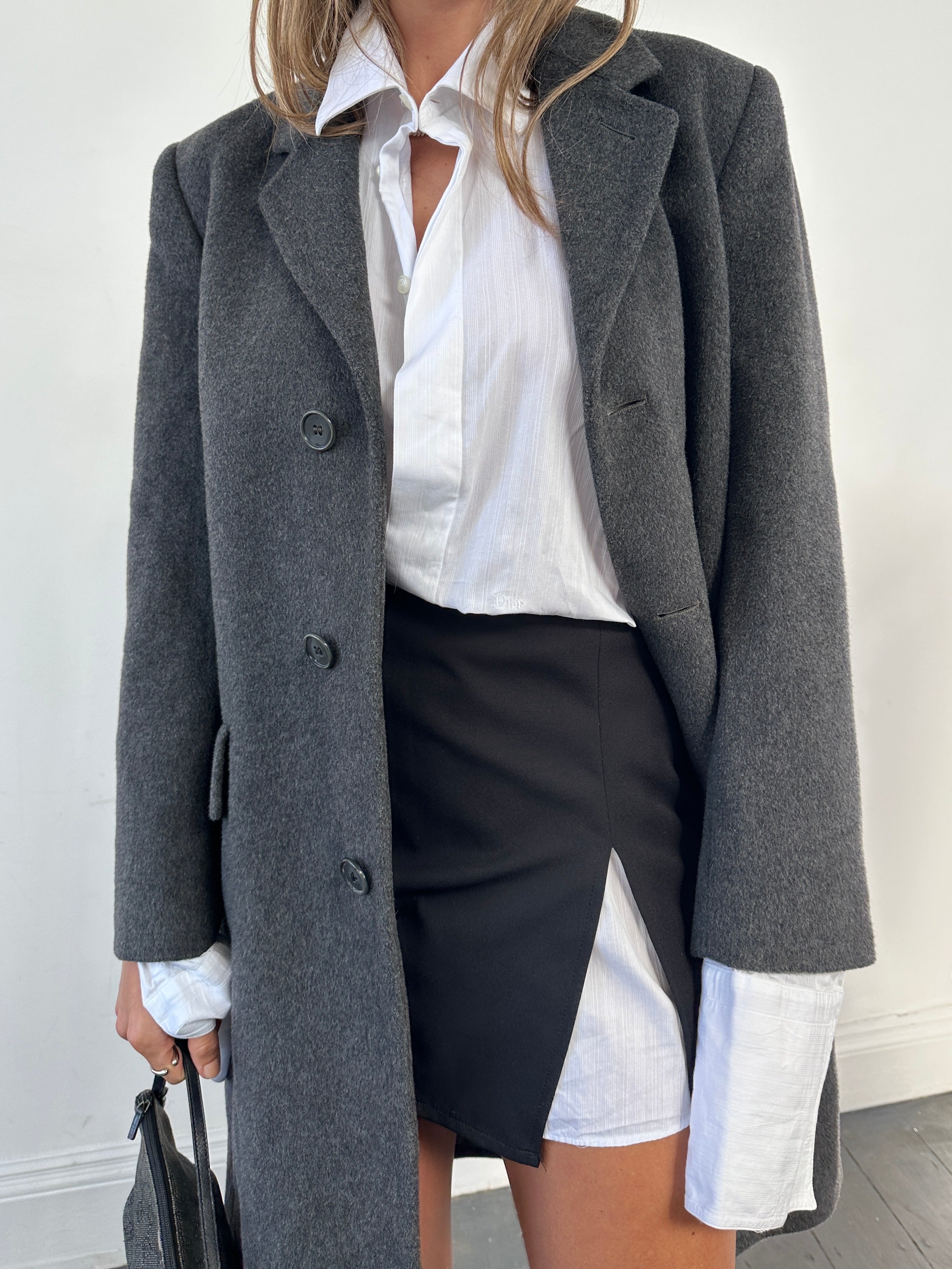Vintage wool cashmere coat in size S/M, showcasing a classic, cozy outerwear piece with a tailored fit and stylish design.