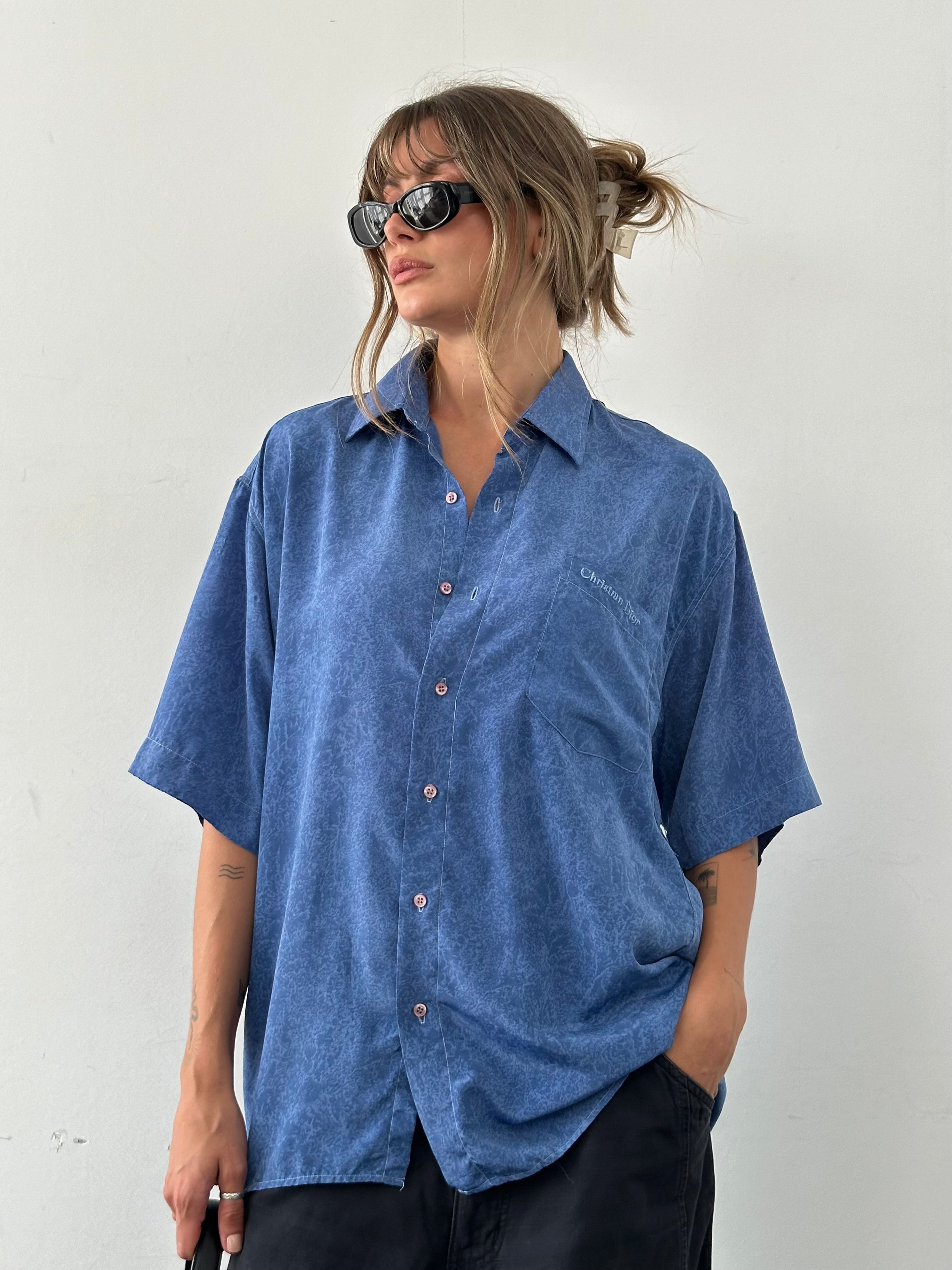 Christian Dior 90s silk print short sleeve shirt with logo, featuring vibrant design and relaxed fit, in size XL.