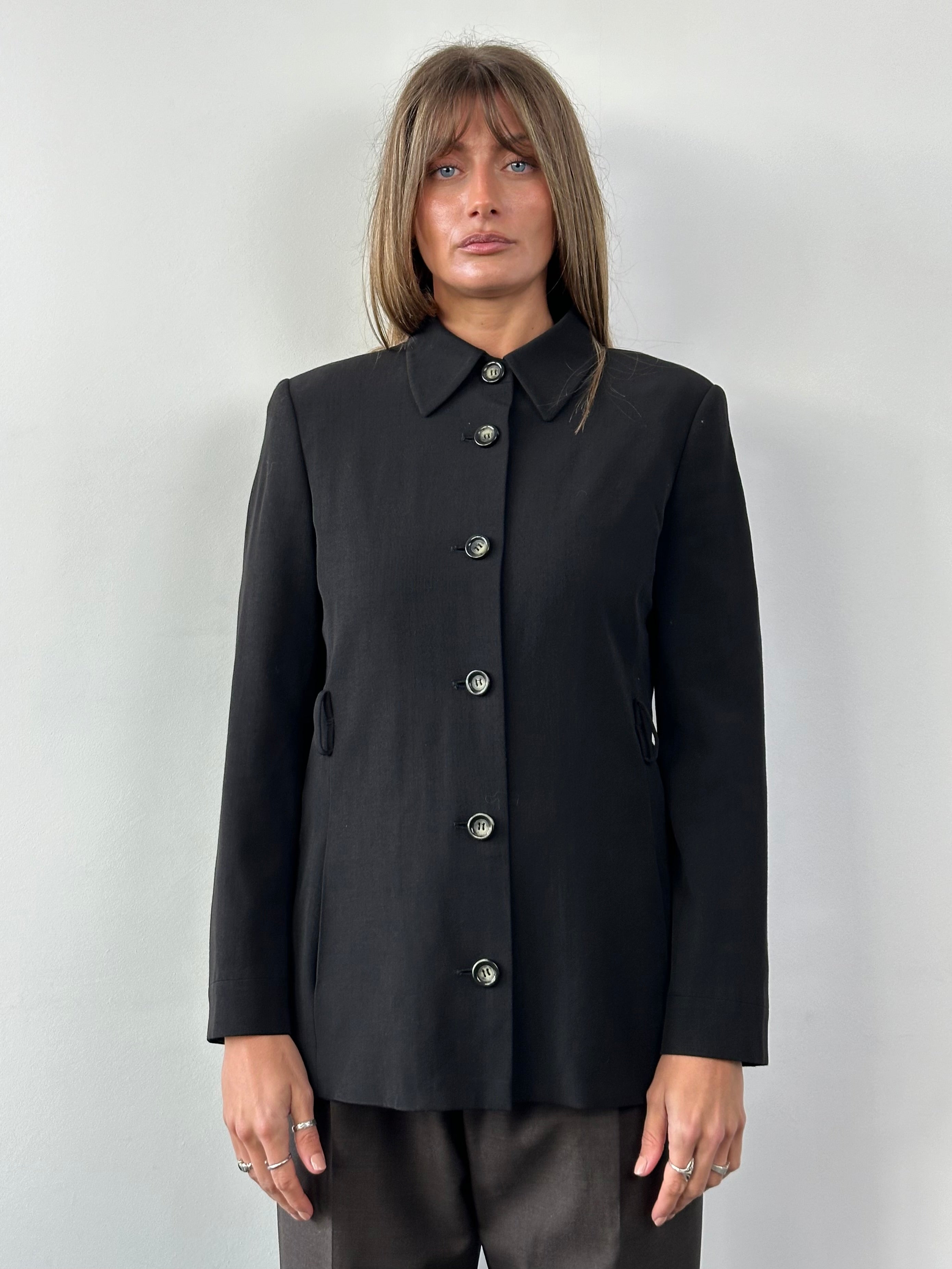Iceberg 1990s virgin wool tailored jacket in size M, featuring a classic design with a structured fit and detailed stitching.