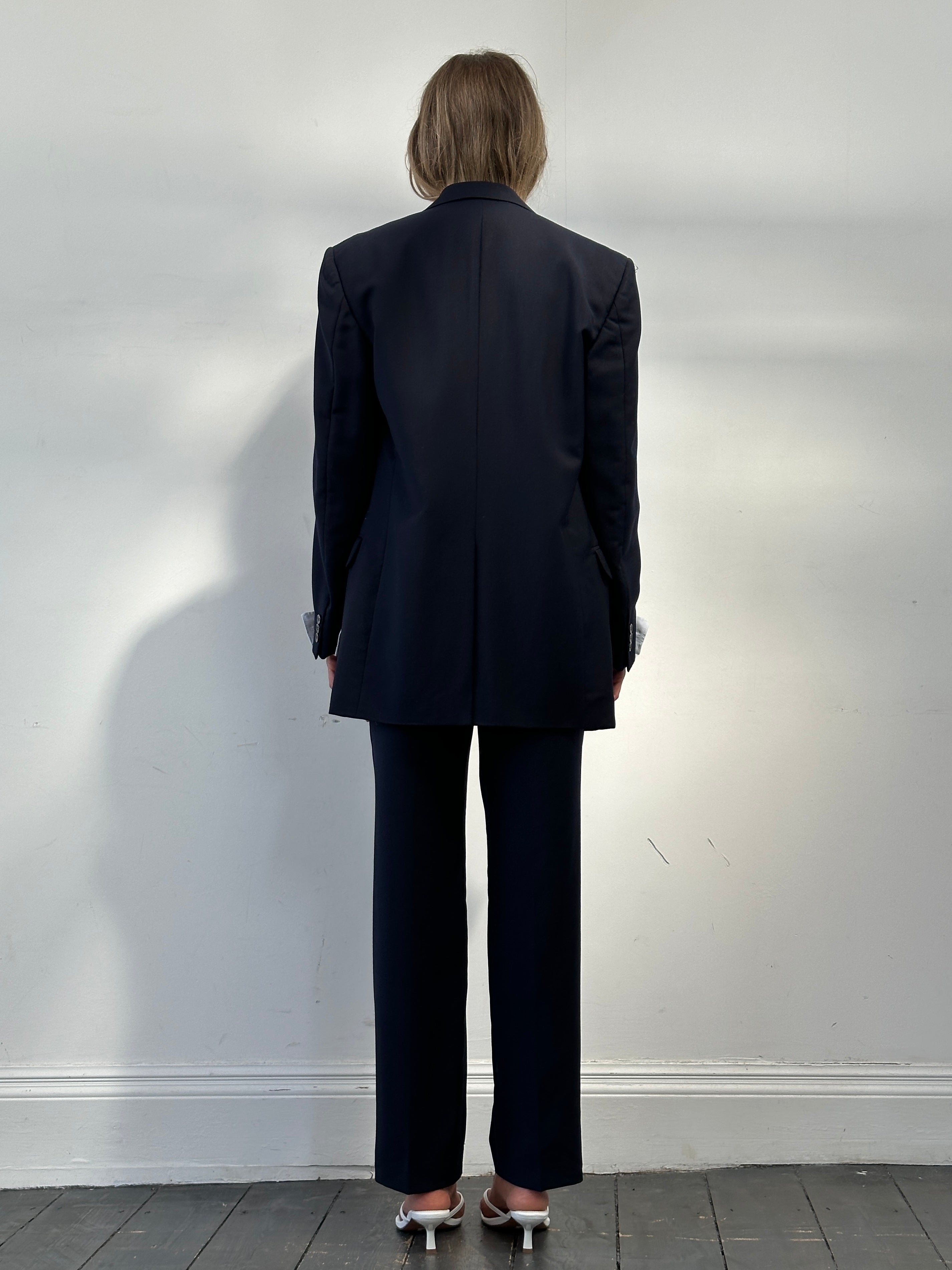 Yves Saint Laurent Virgin Wool Mohair single-breasted suit in size 38R/W28, shown in a tailored jumpsuit style with classic lapels.