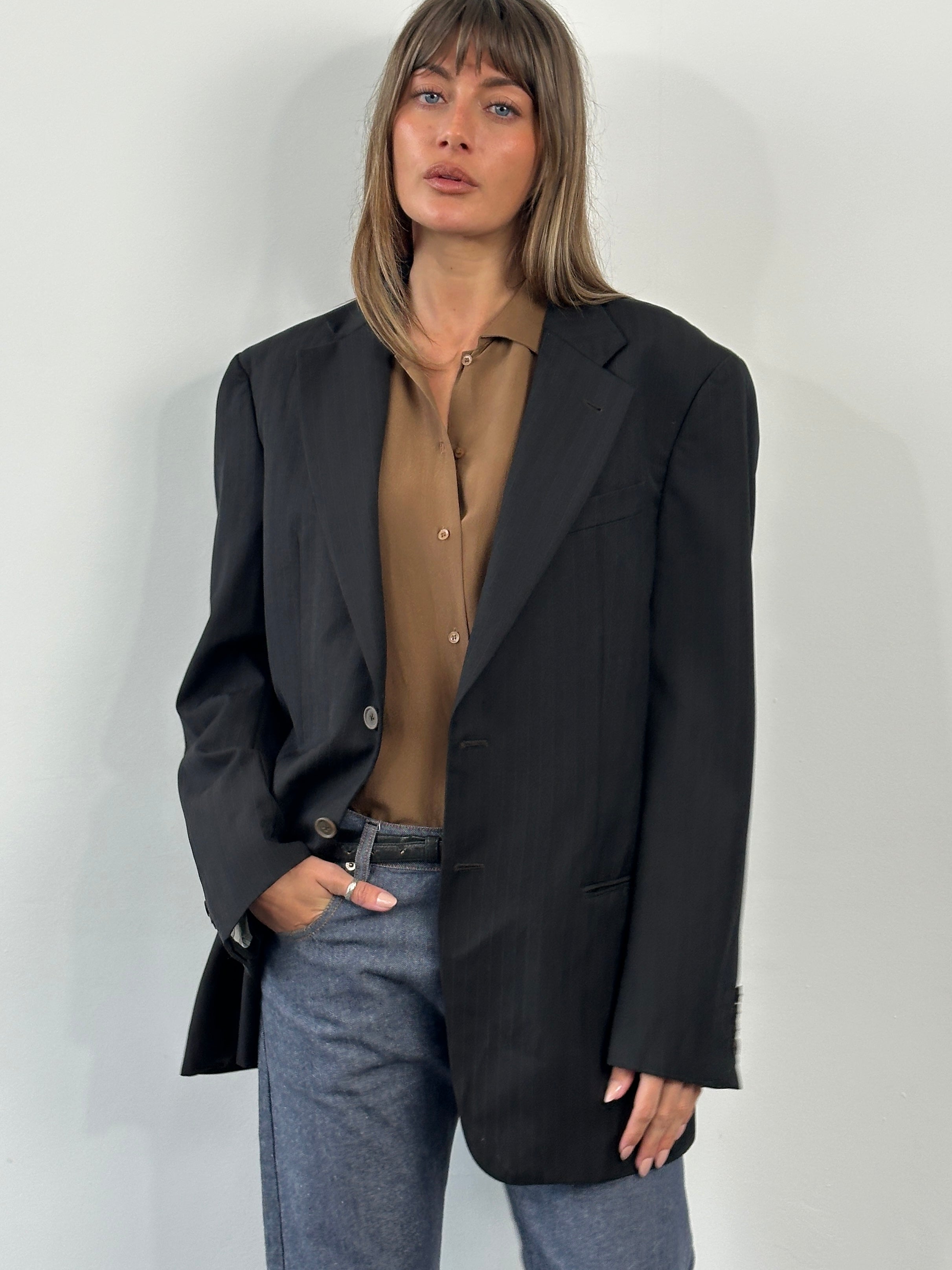 Armani Collezioni 2000s pure wool pinstripe blazer in size 40R/L, featuring classic tailored fit and dark pinstripe pattern.
