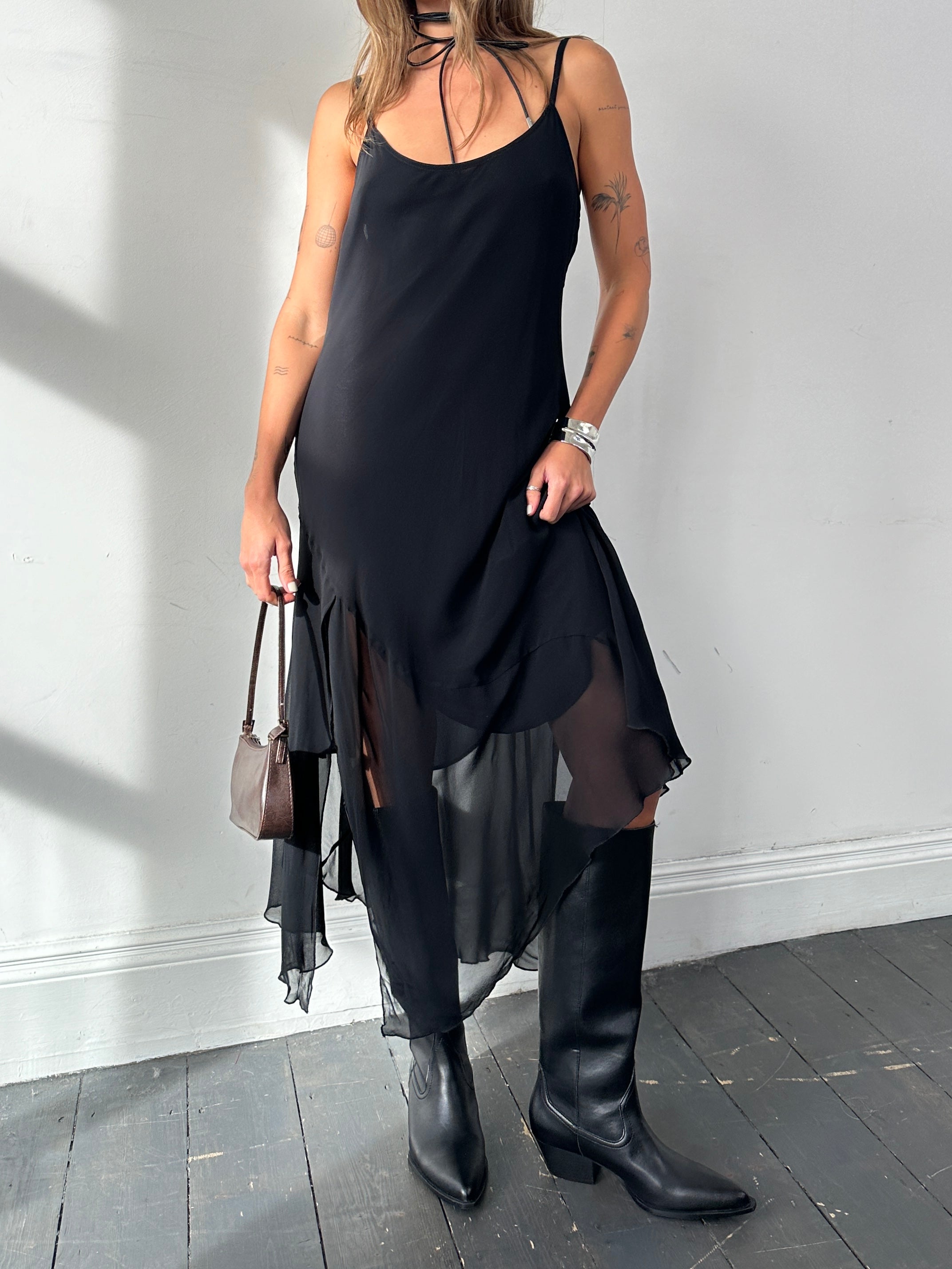 Vintage Italian vintage slip dress with split hem in size large, featuring elegant fabric and classic design.