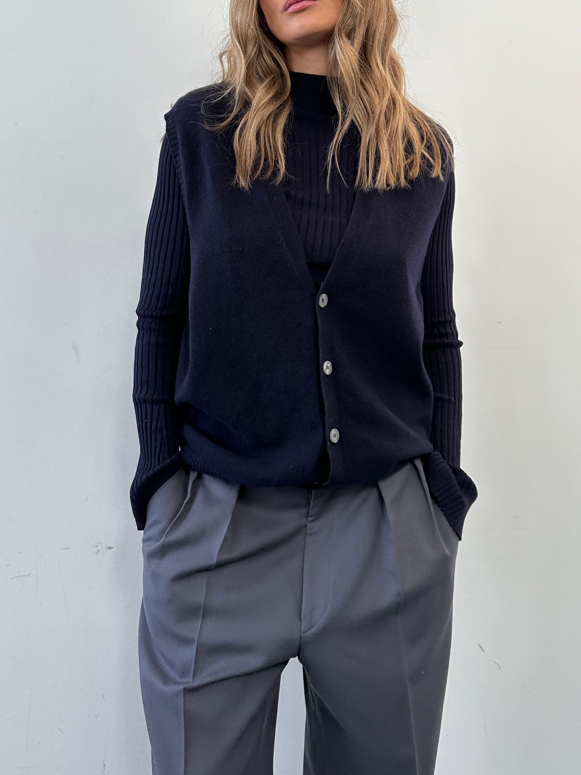 Vintage brand vintage cashmere sleeveless cardigan in size large, soft knit with a classic design and button closure.