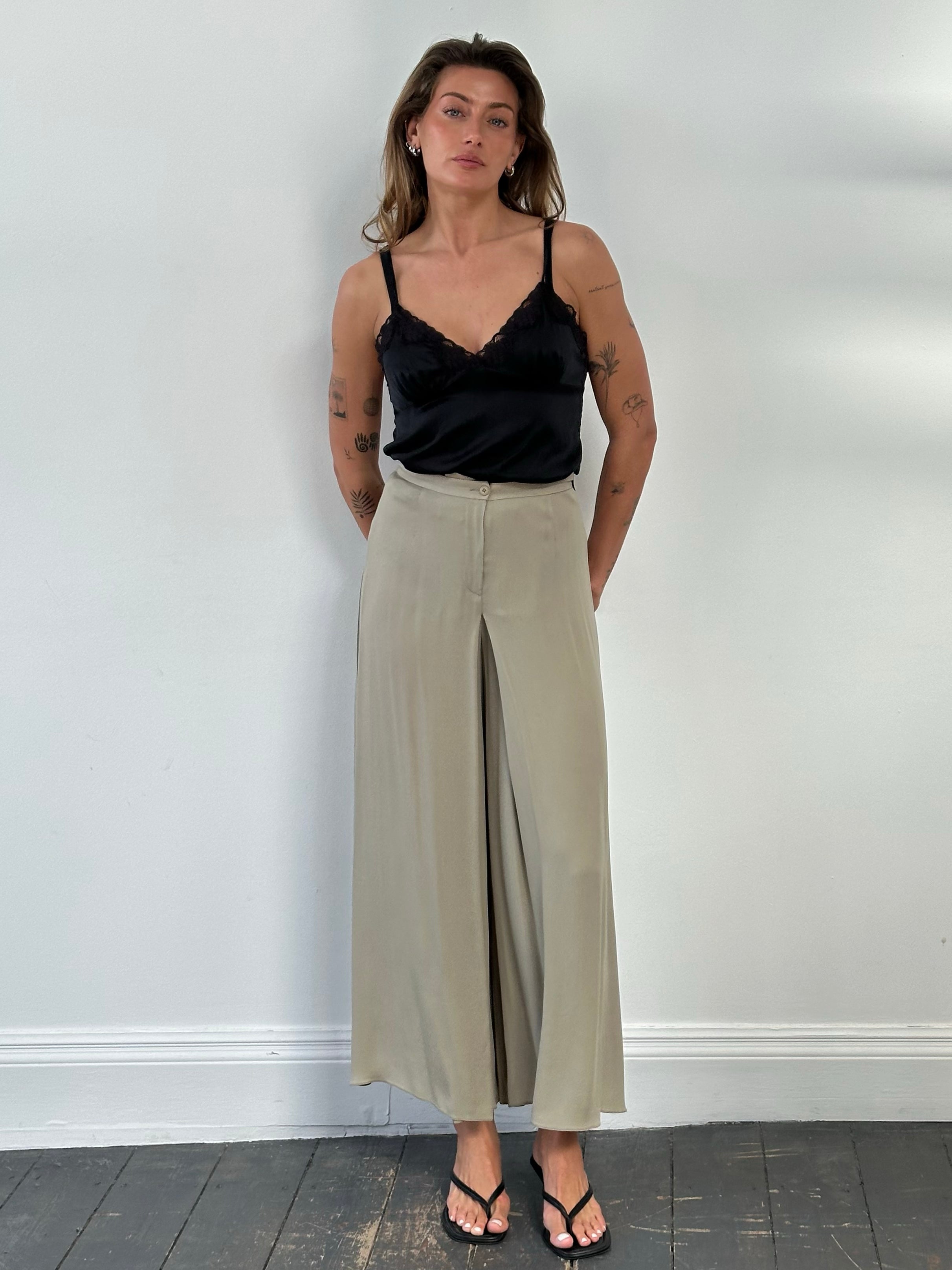 Armani Collezioni 2000s silk wide-leg pleated trousers in size W26, showcasing elegant beige fabric and tailored design.