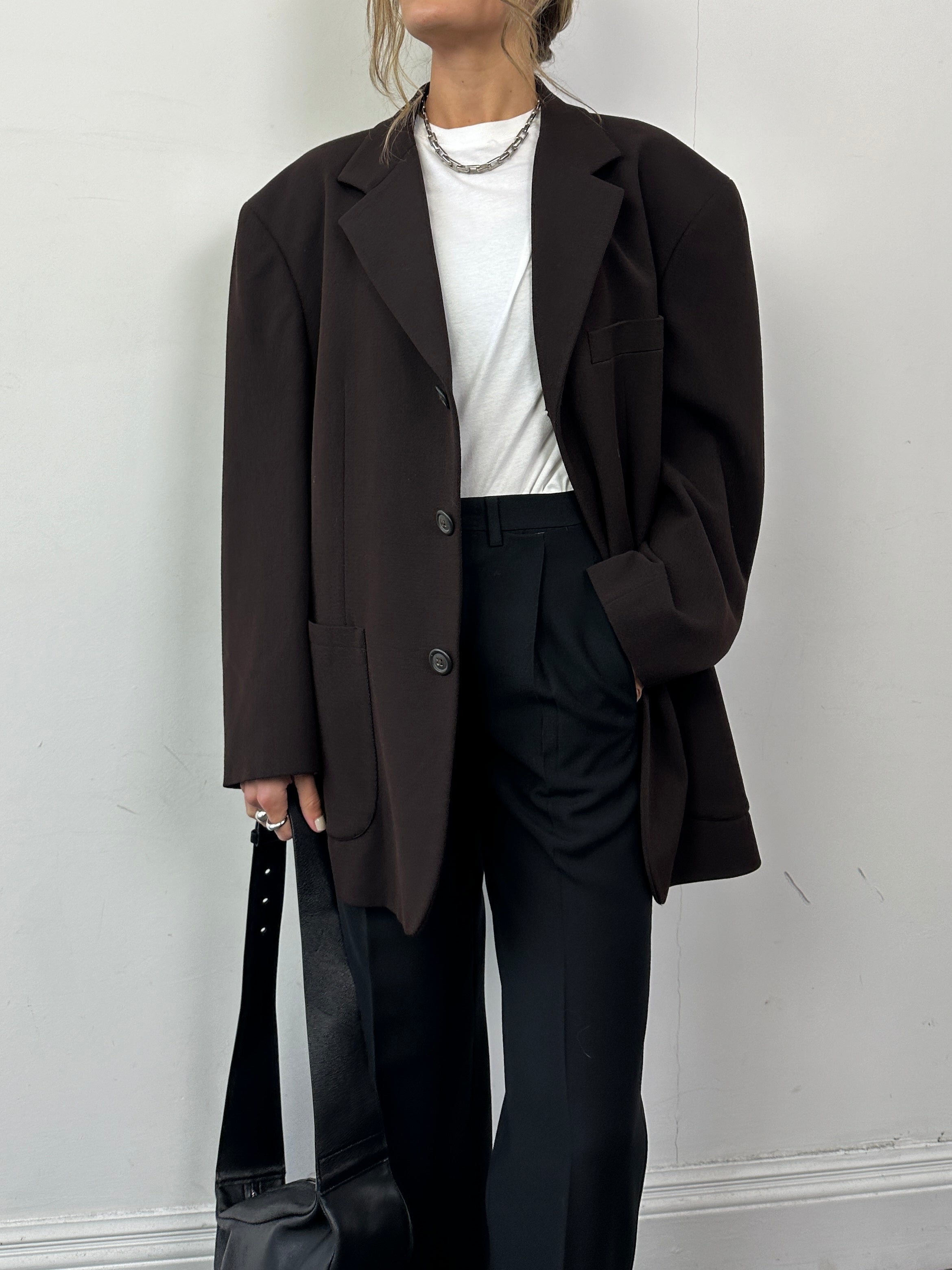 Armani oversized single-breasted blazer in size 46/XL, tailored fit, in classic neutral fabric, displayed on a hanger.