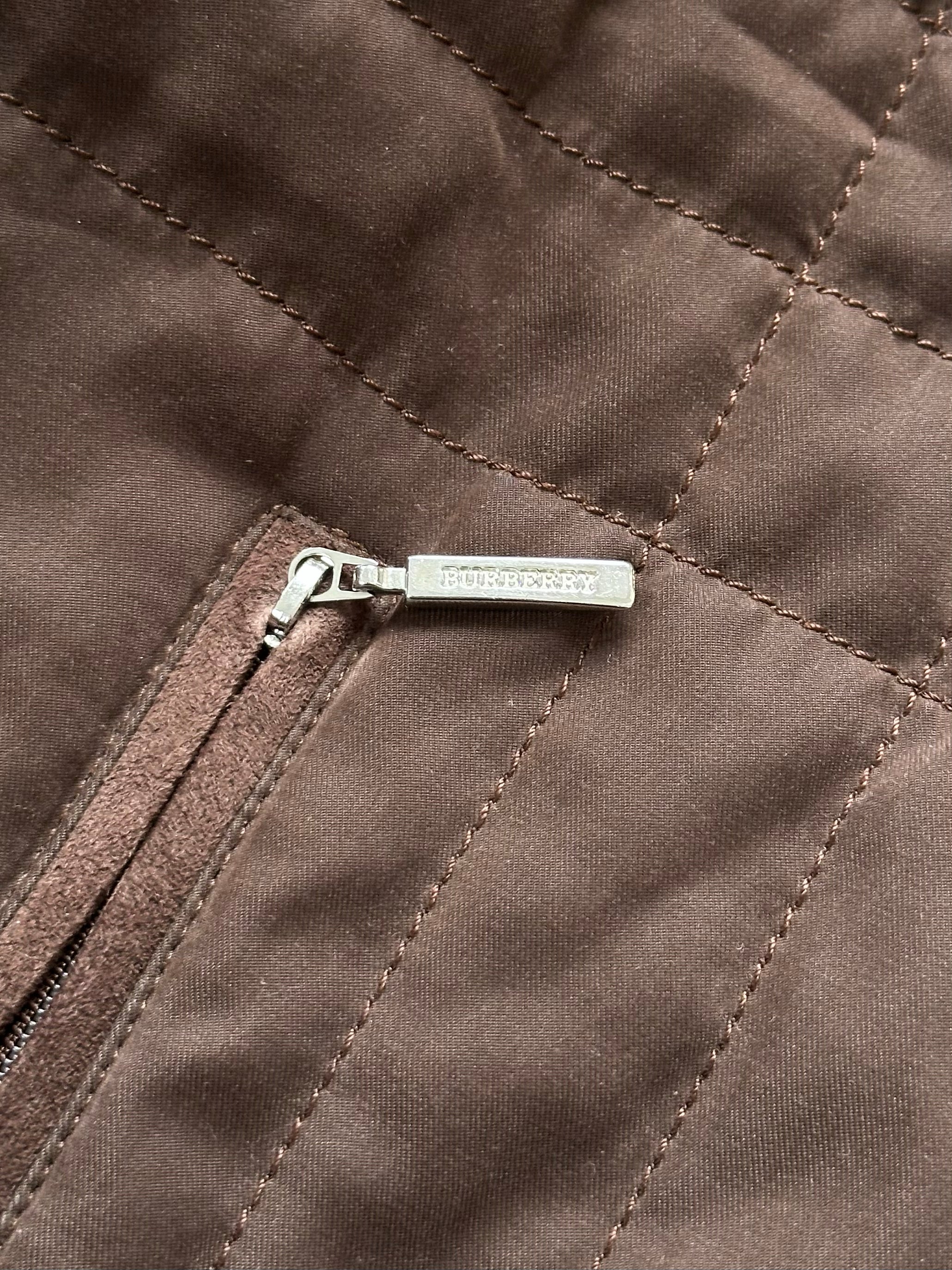 Burberry London 2000s cotton check jacket in size M, featuring classic plaid pattern and tailored fit.