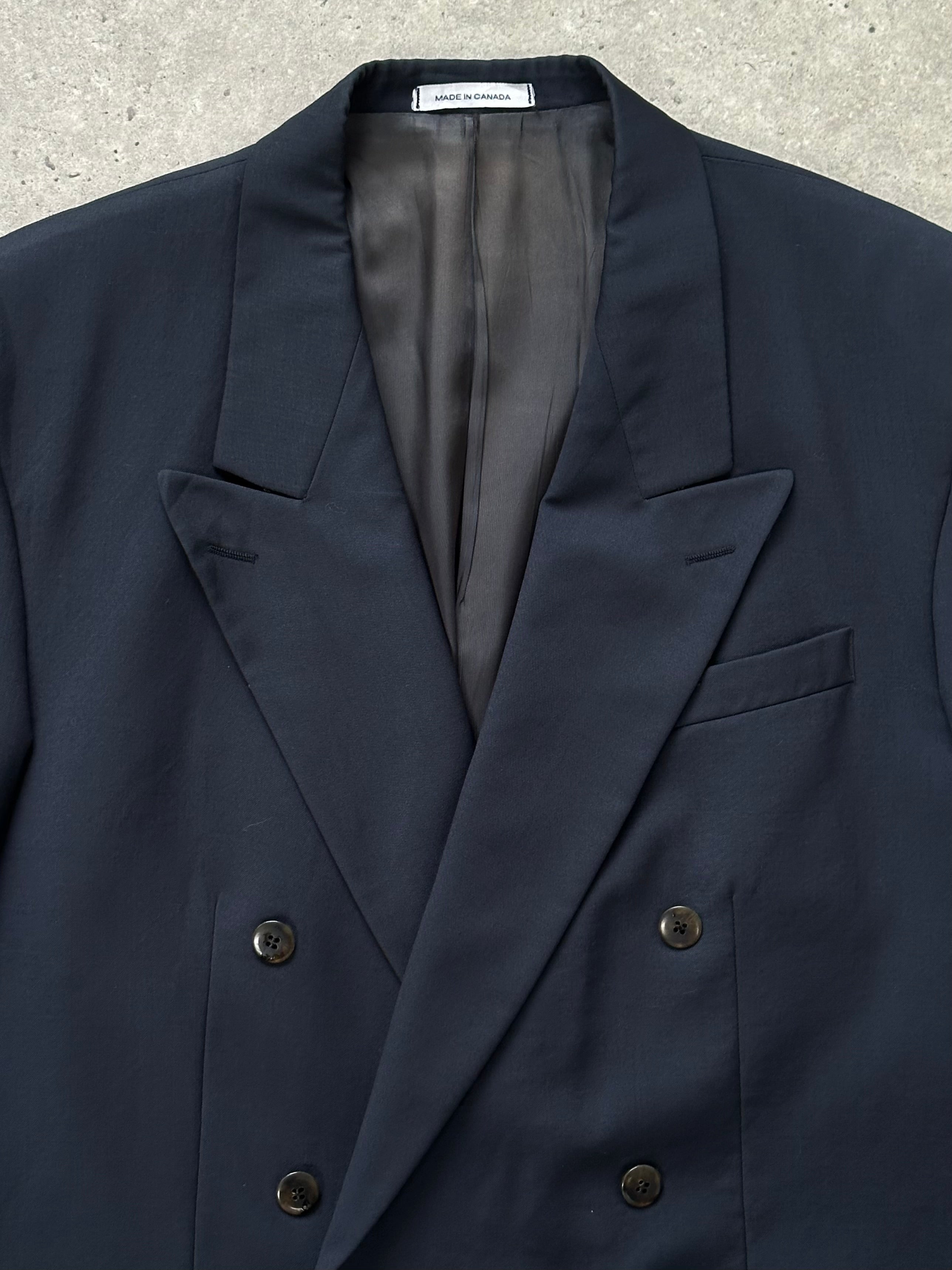 Yves Saint Laurent 1990s wool double-breasted blazer in size 44R/XL, featuring classic tailored fit and structured lapels.