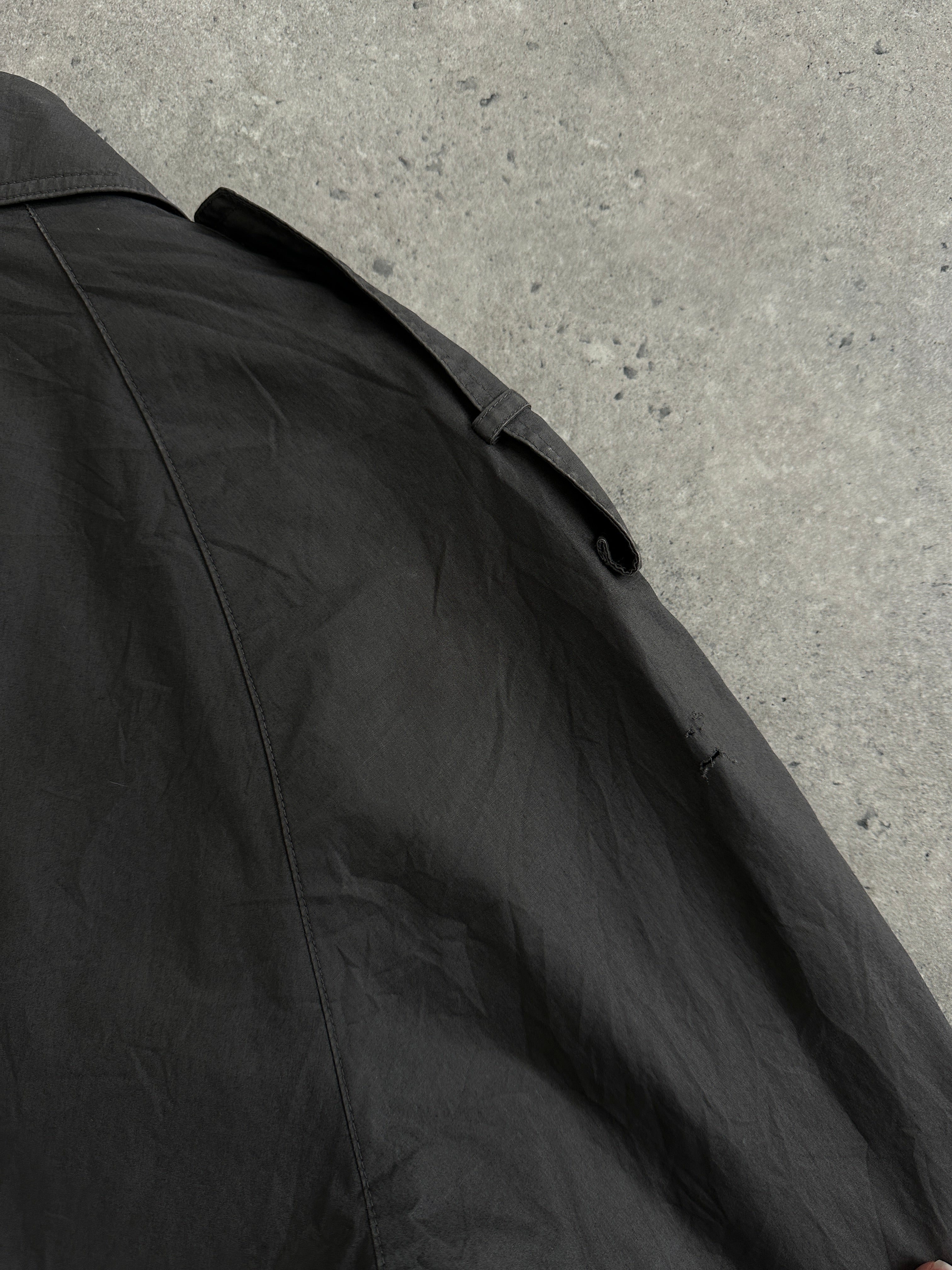 Yves Saint Laurent Pour Homme pure cotton trench coat with concealed placket, in a stylish men's M/L size, displayed on a hanger.