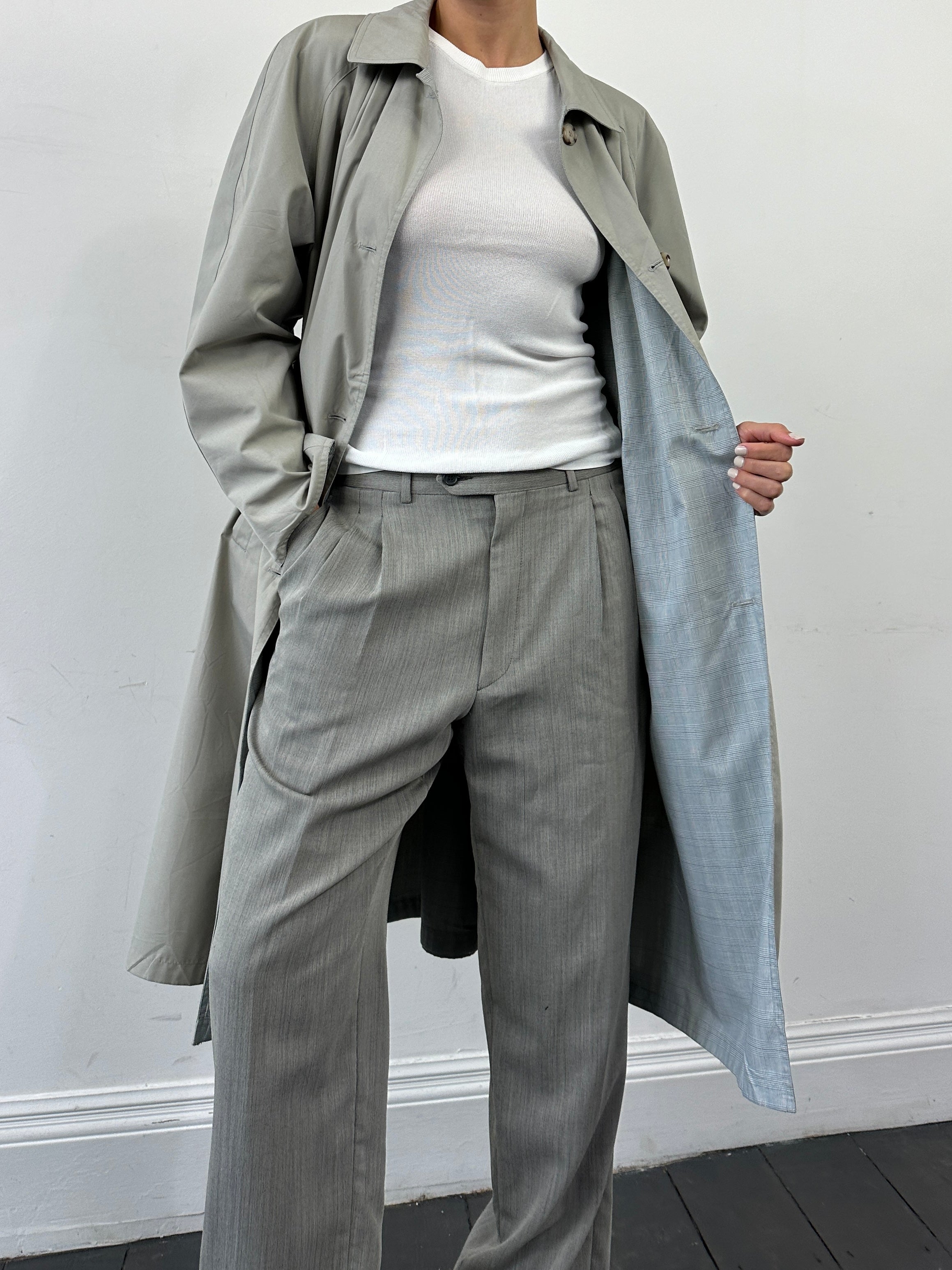 Vintage reversible showerproof check trench coat with belt, size large, featuring classic pattern and waterproof fabric.
