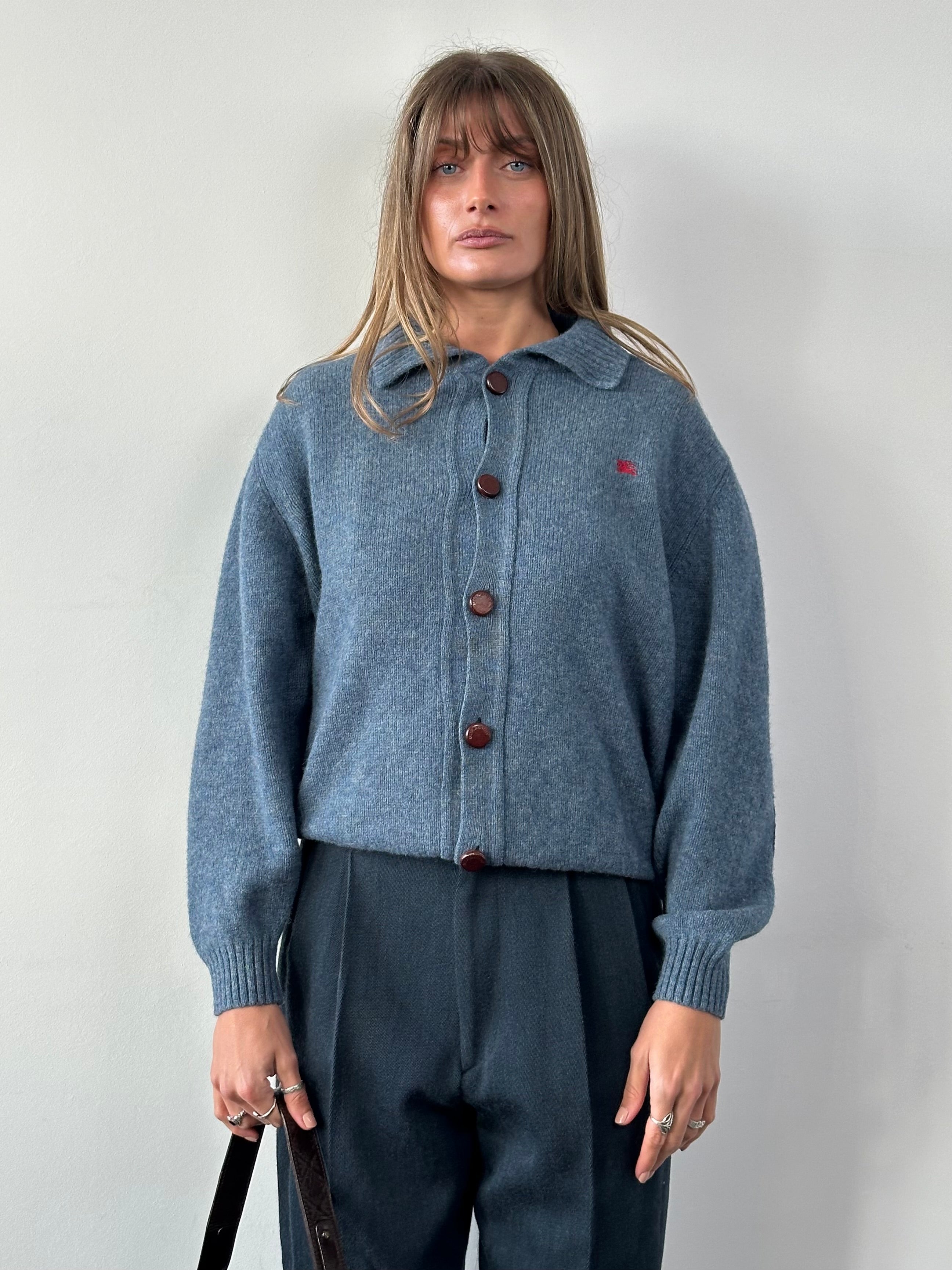 Burberry London wool knitted logo cardigan in size M/L, featuring a classic design and distinctive Burberry branding.