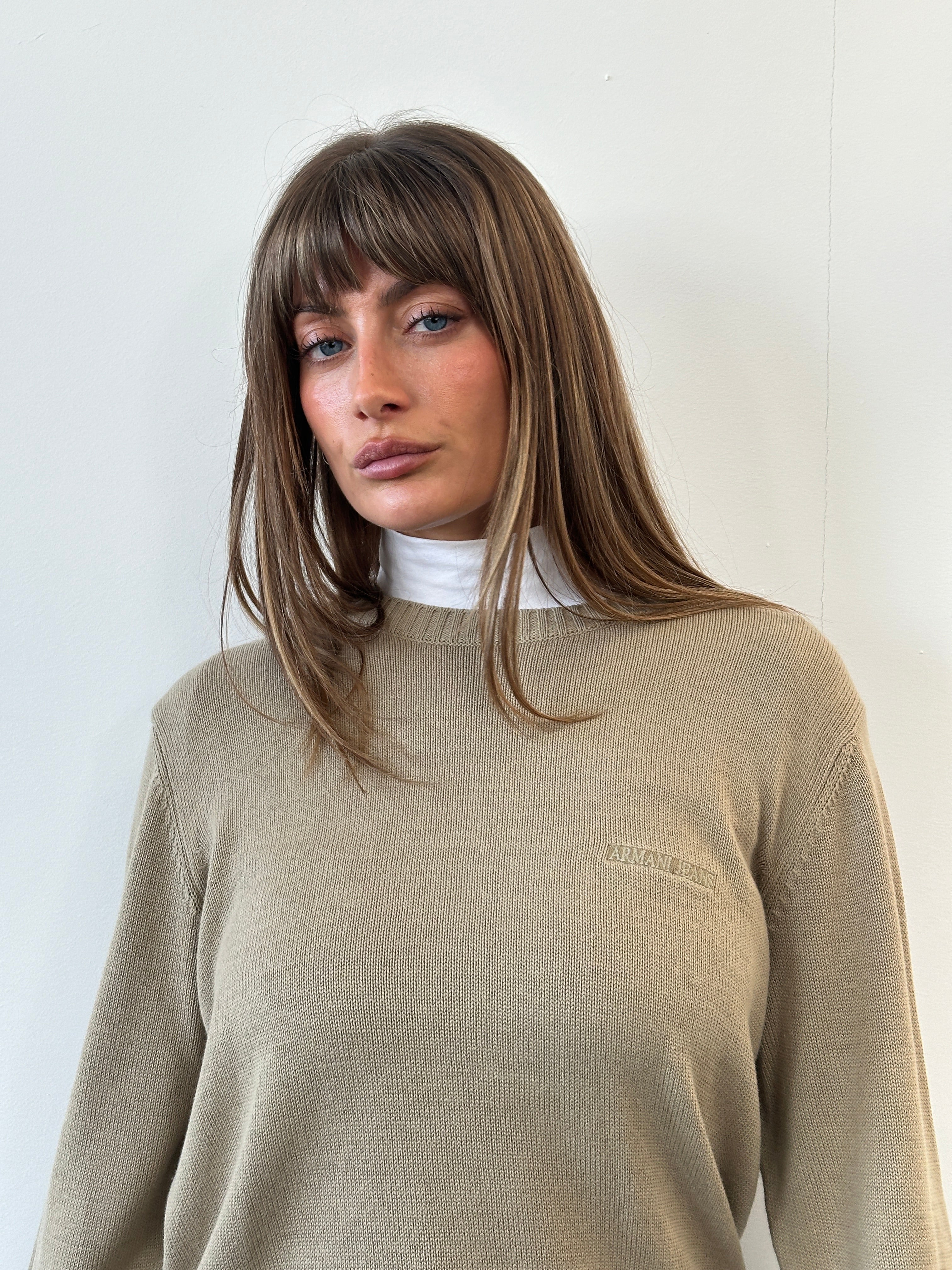 Armani Jeans 1990s pure cotton logo knitted jumper in size L, featuring a classic design and brand logo on the front.
