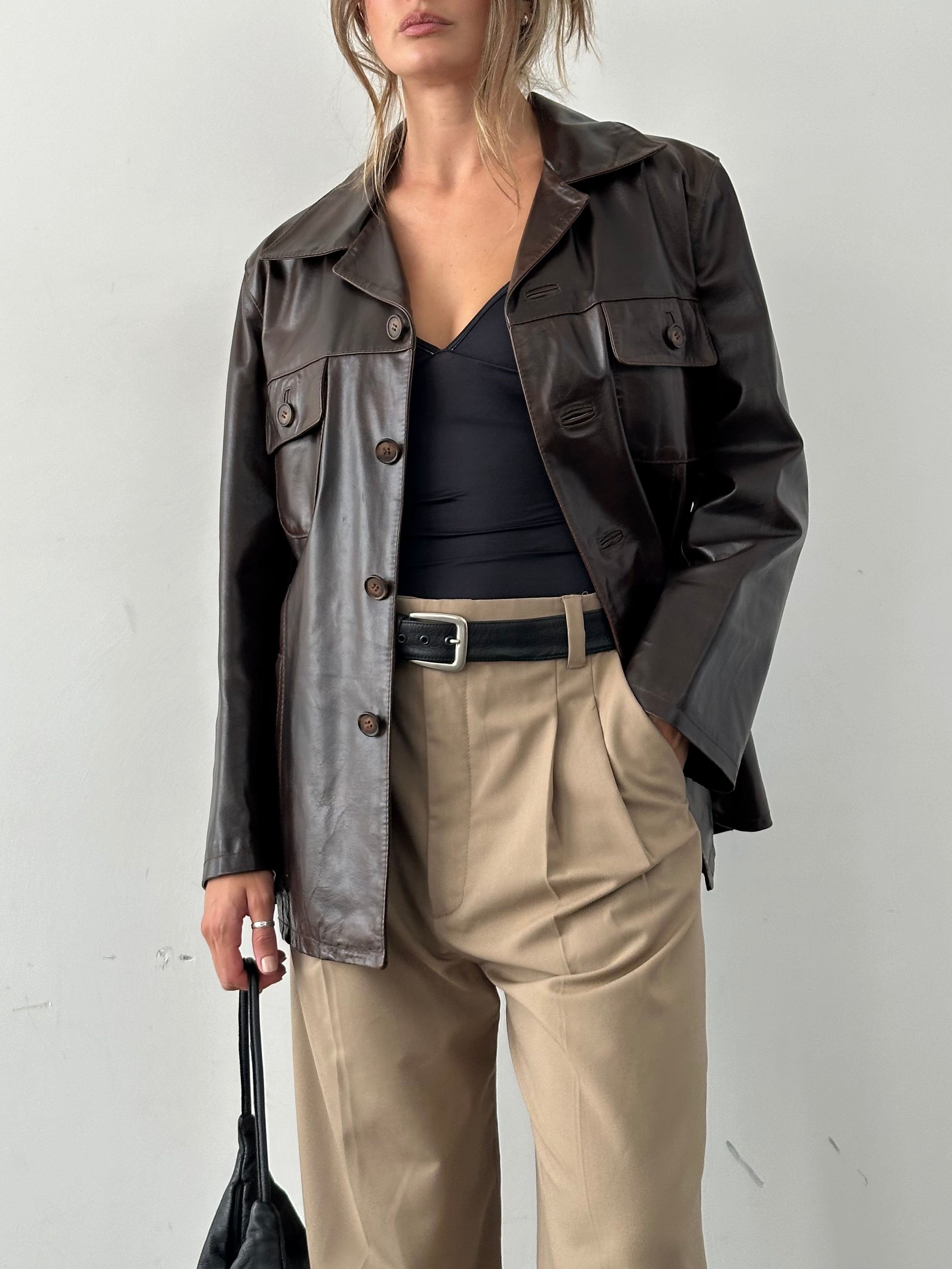 Conbipel boxy leather jacket in size L, featuring a stylish design with smooth black leather and tailored fit.
