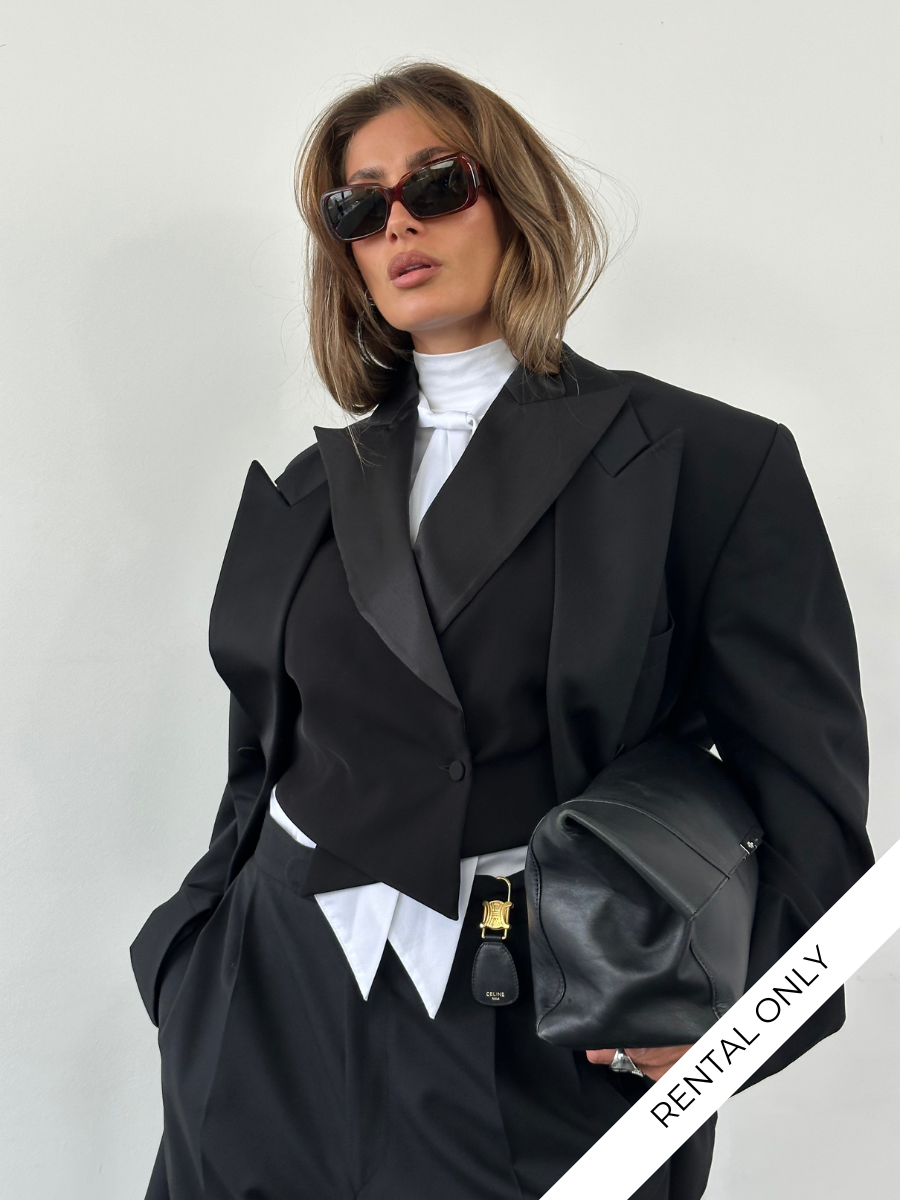 Emporio Armani SS2002 pure silk tuxedo waistcoat in size M, front view showing elegant black fabric and sleek design.