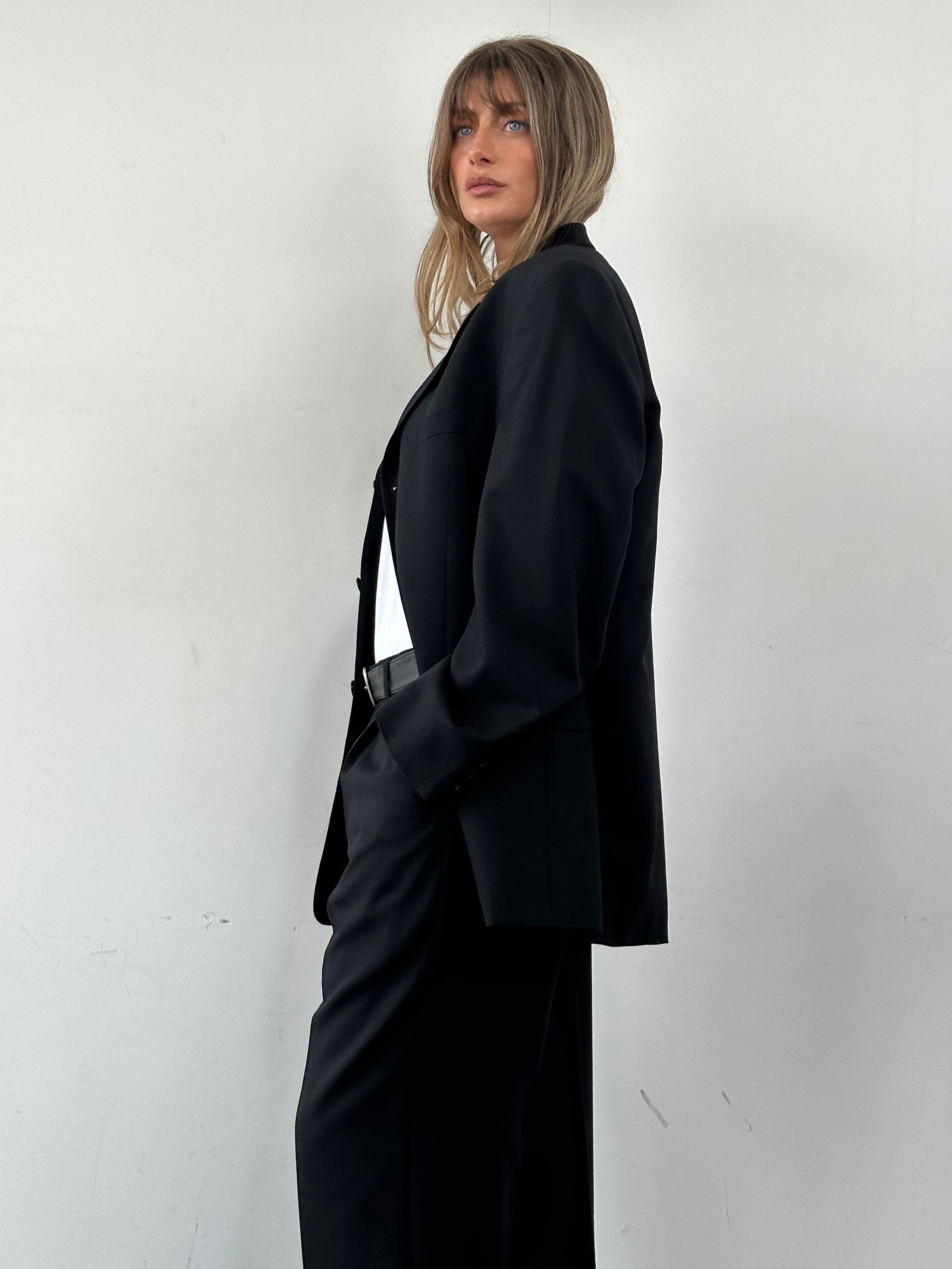 Pierre Cardin single-breasted wool jumpsuit in size 40R/W33, tailored fit with lapel collar and classic design.
