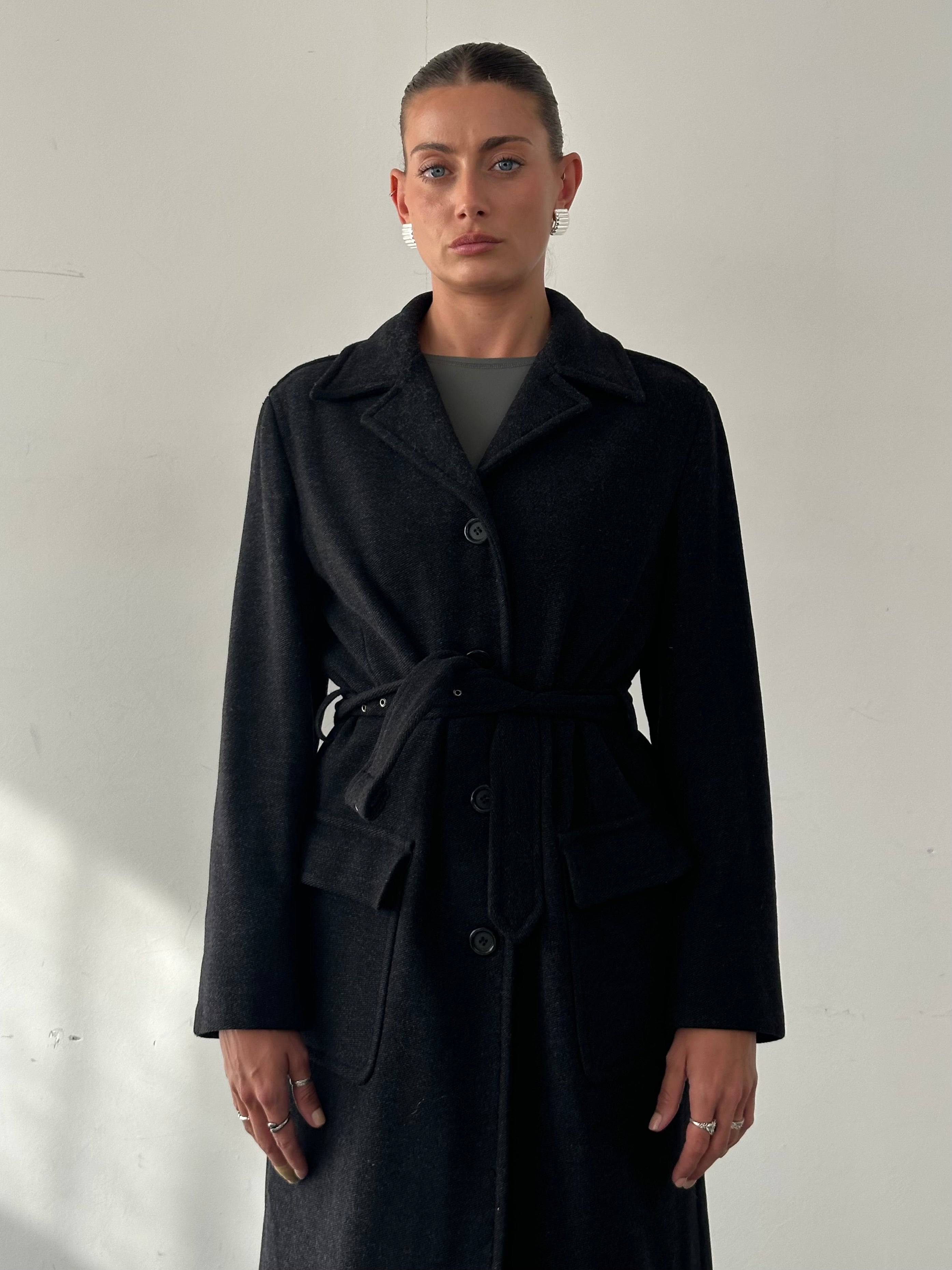Max & Co virgin wool floor-length belted coat displayed on a hanger, showcasing its elegant design and classic belt detail.