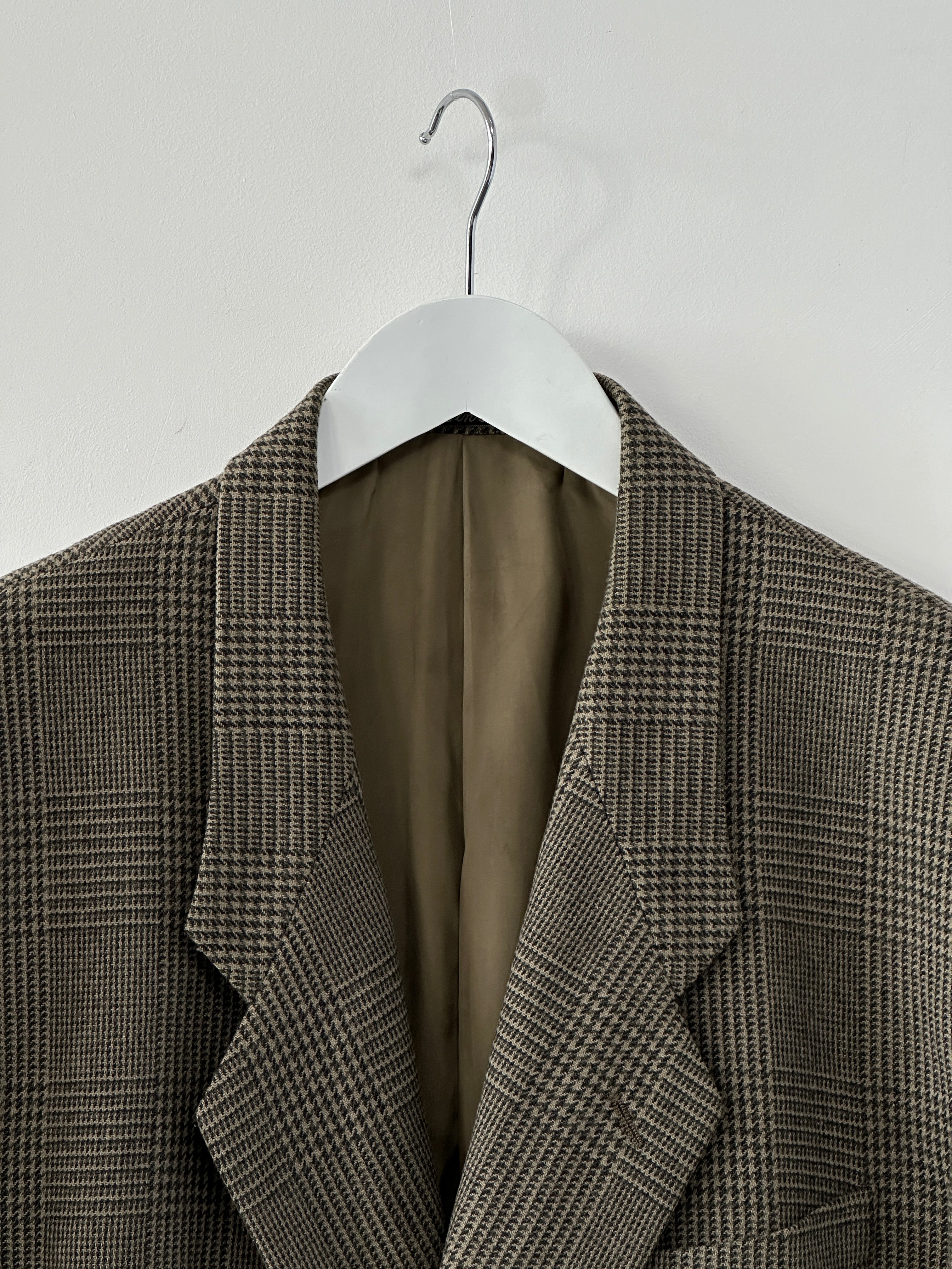 Giorgio Armani pure wool check blazer in XL size, tailored fit with classic pattern, featuring notch lapel and button closure.