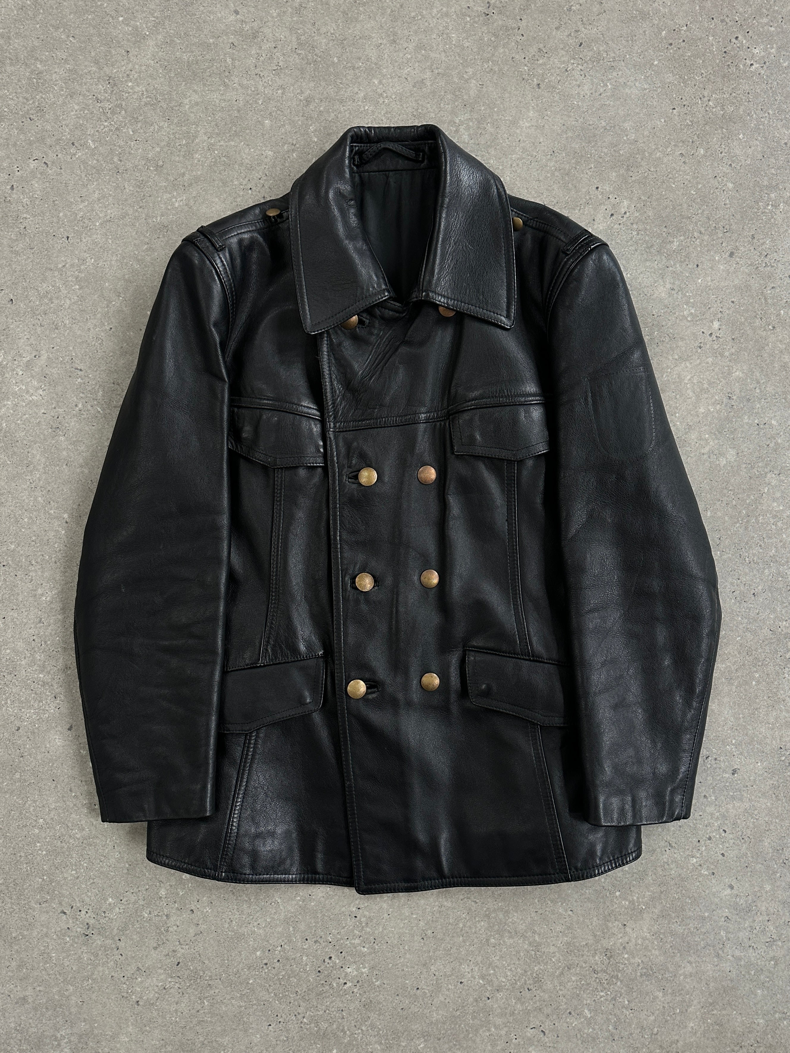 Vintage 1980s double-breasted military leather jacket, men's size M/L, featuring classic style and aged leather finish.