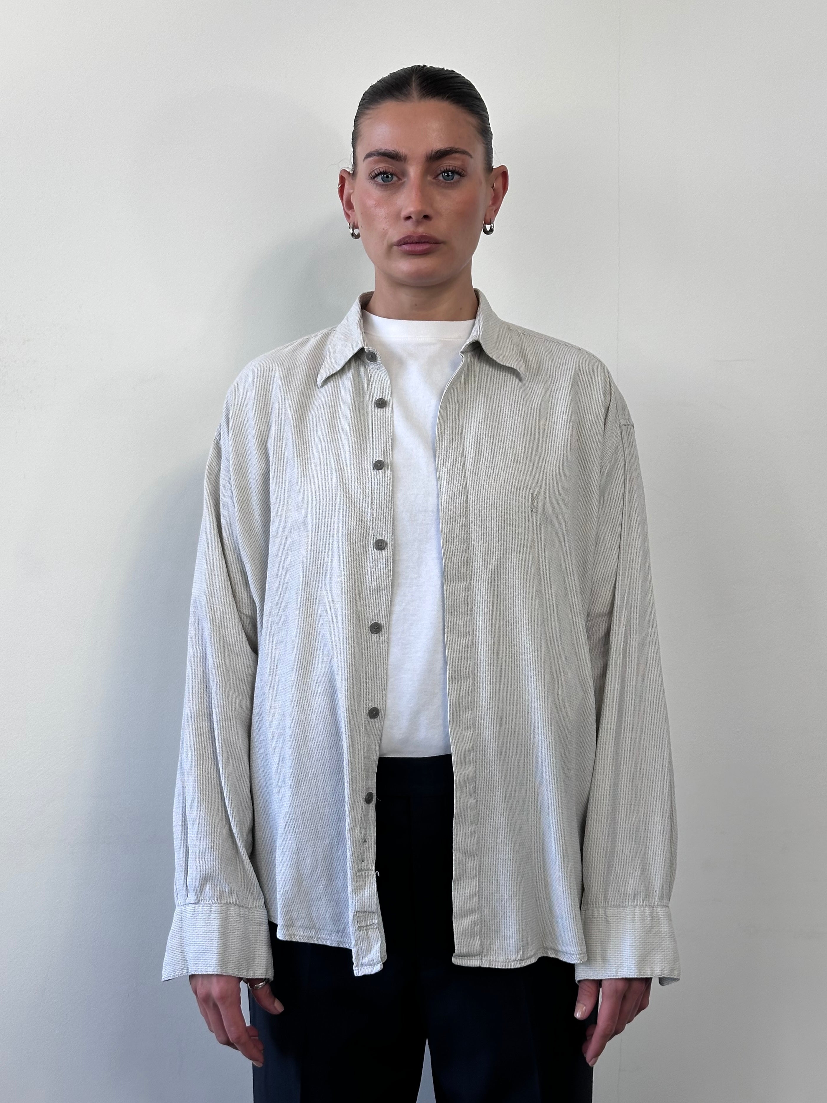 Yves Saint Laurent Pour Homme 1990s cotton logo shirt in size M/L, featuring the iconic YSL logo on the front.