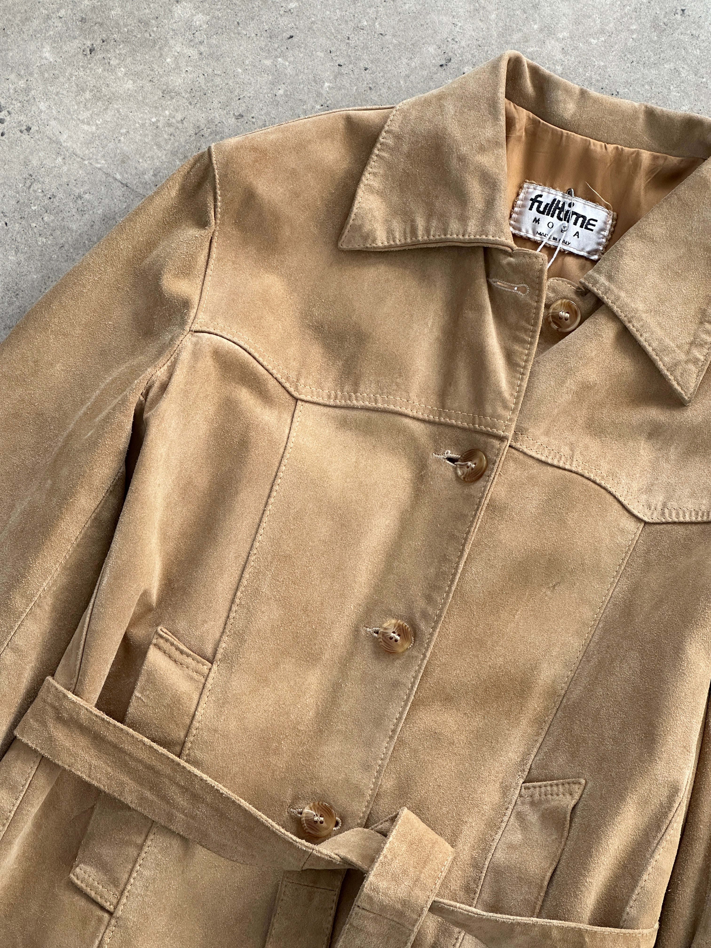 Vintage Italian suede belted jacket in size S/M, stylish and classic with a fold-over collar and waist belt, displayed on a hanger.