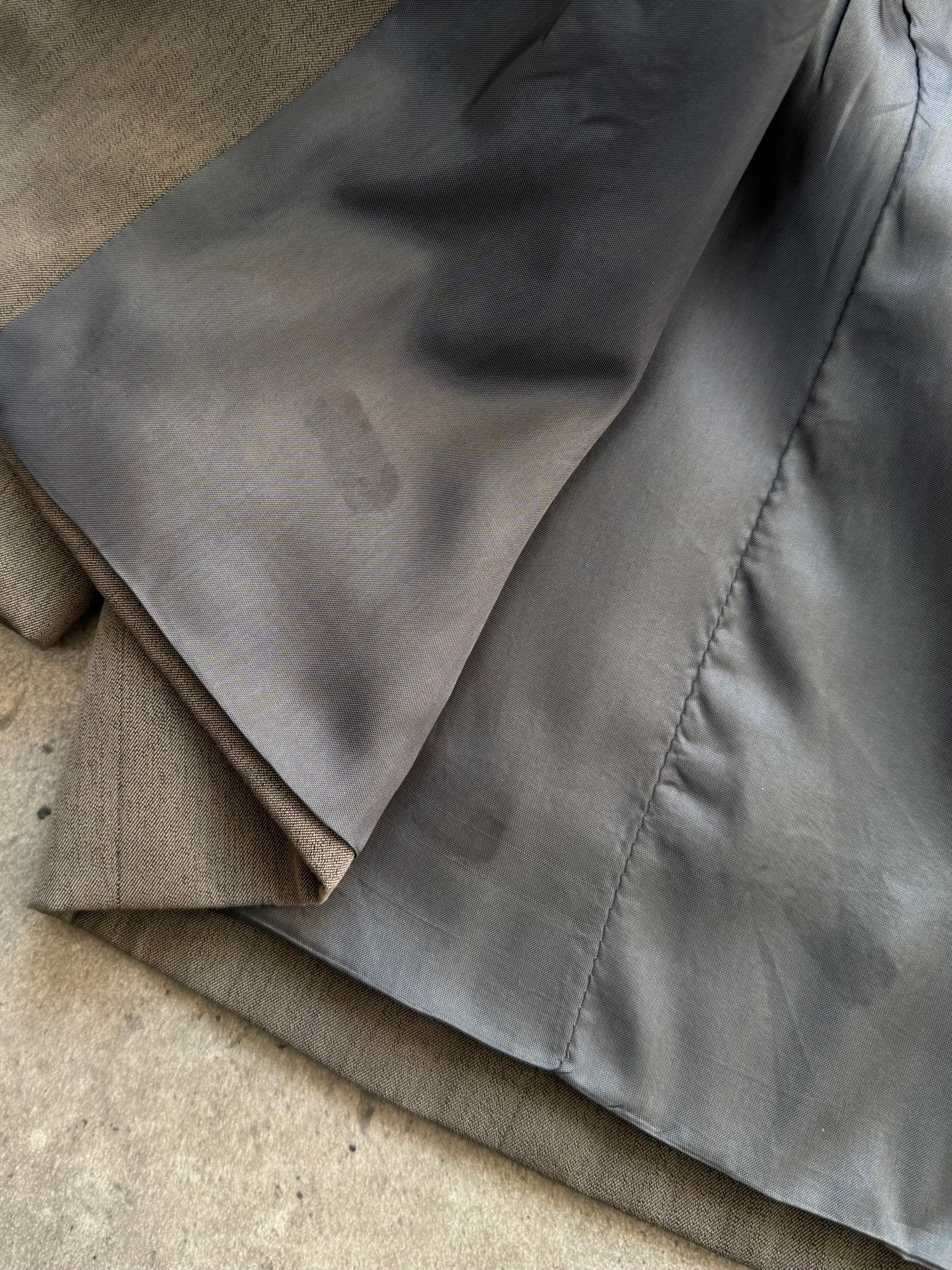 Mani 1990s wool tailored blazer in size S with single button closure, classic fit, and structured lapels, shown on a hanger.