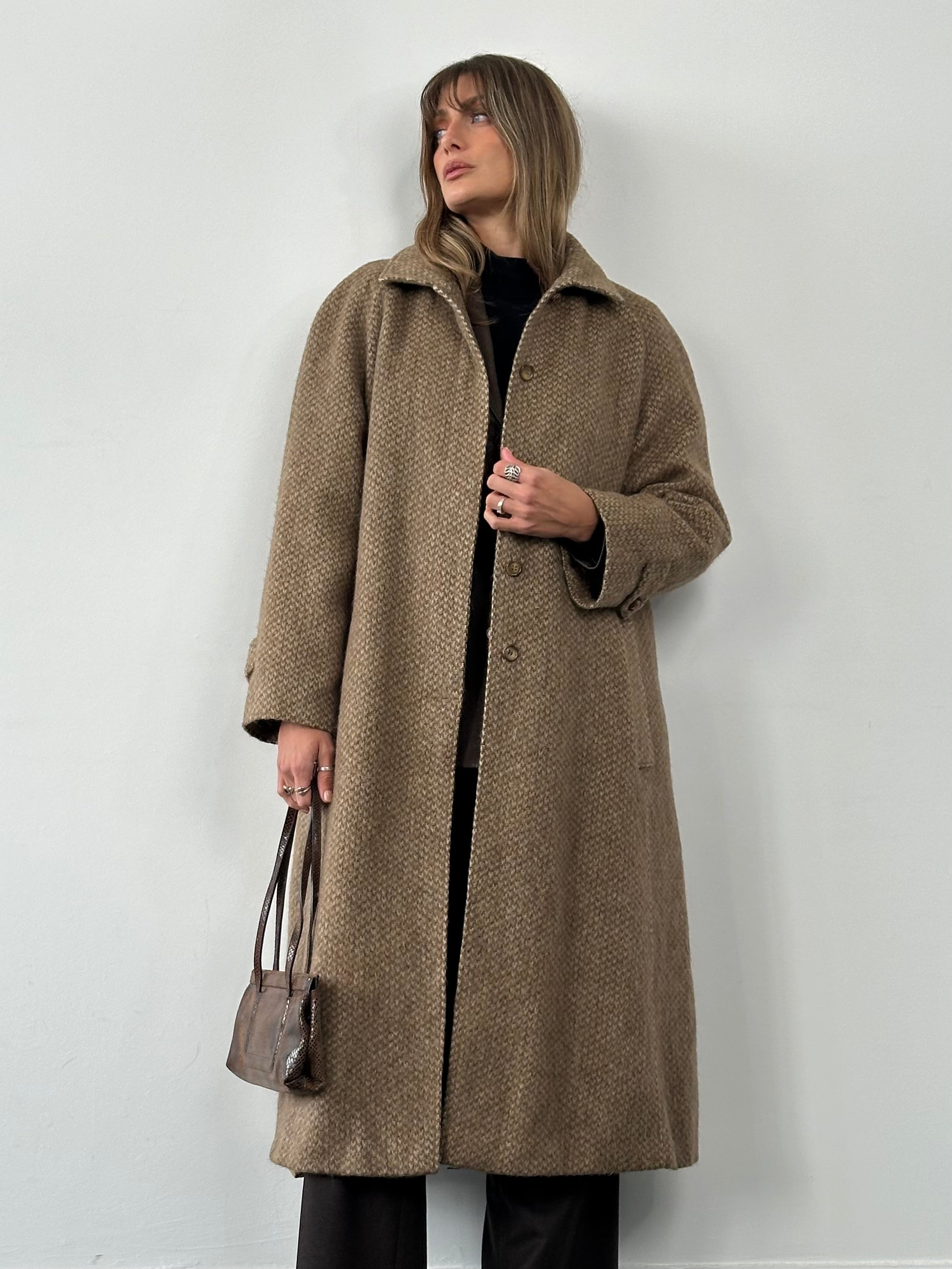 Max Mara fuzzy wool coat with concealed placket, long sleeve, and classic silhouette in size L.