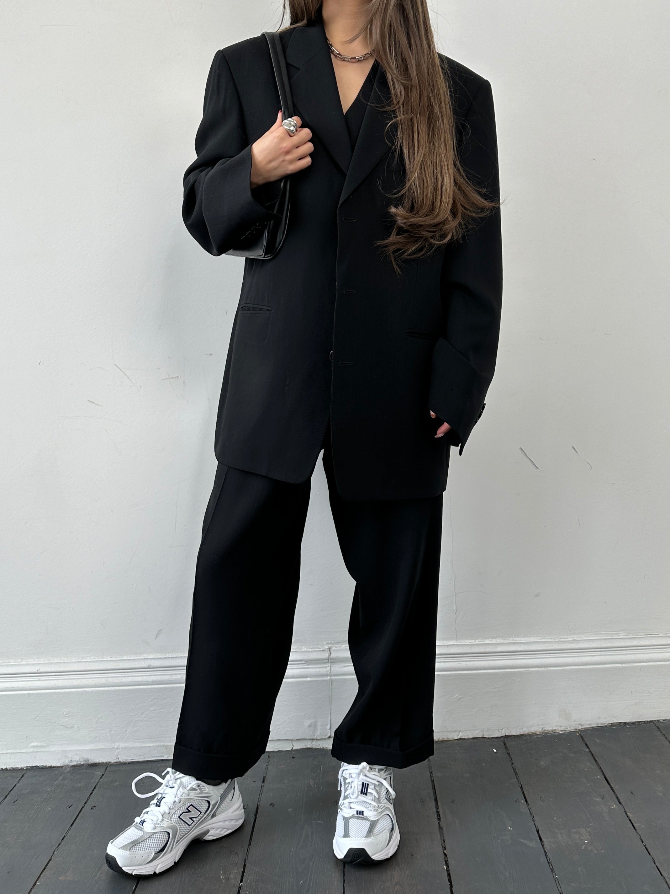 Yves Saint Laurent wool three-piece suit in size 40S/W30, tailored with a fitted jacket, vest, and trousers, navy blue fabric.