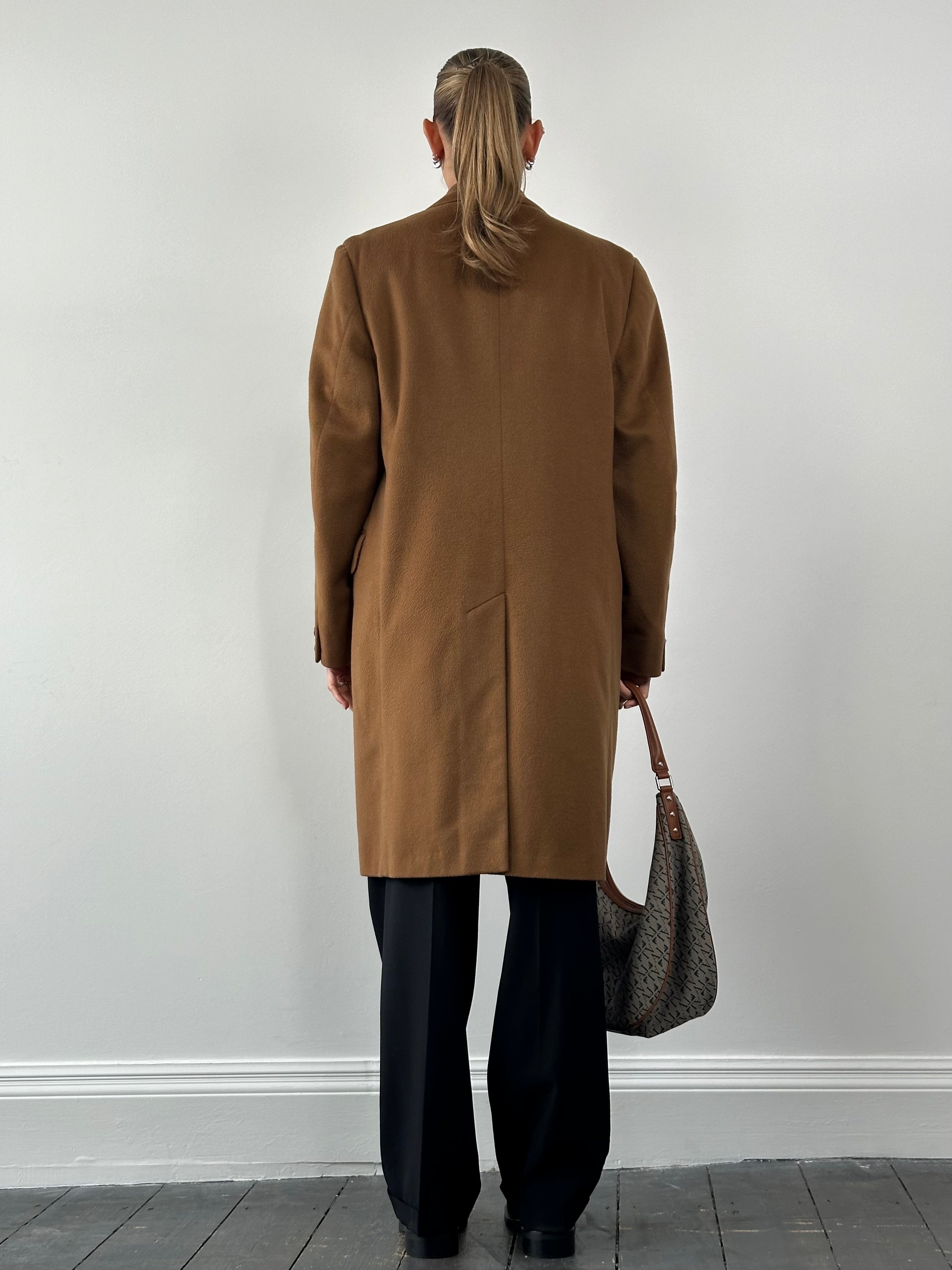Vintage pure cashmere coat with concealed placket, in size L/XL, featuring a classic design and soft, luxurious fabric.