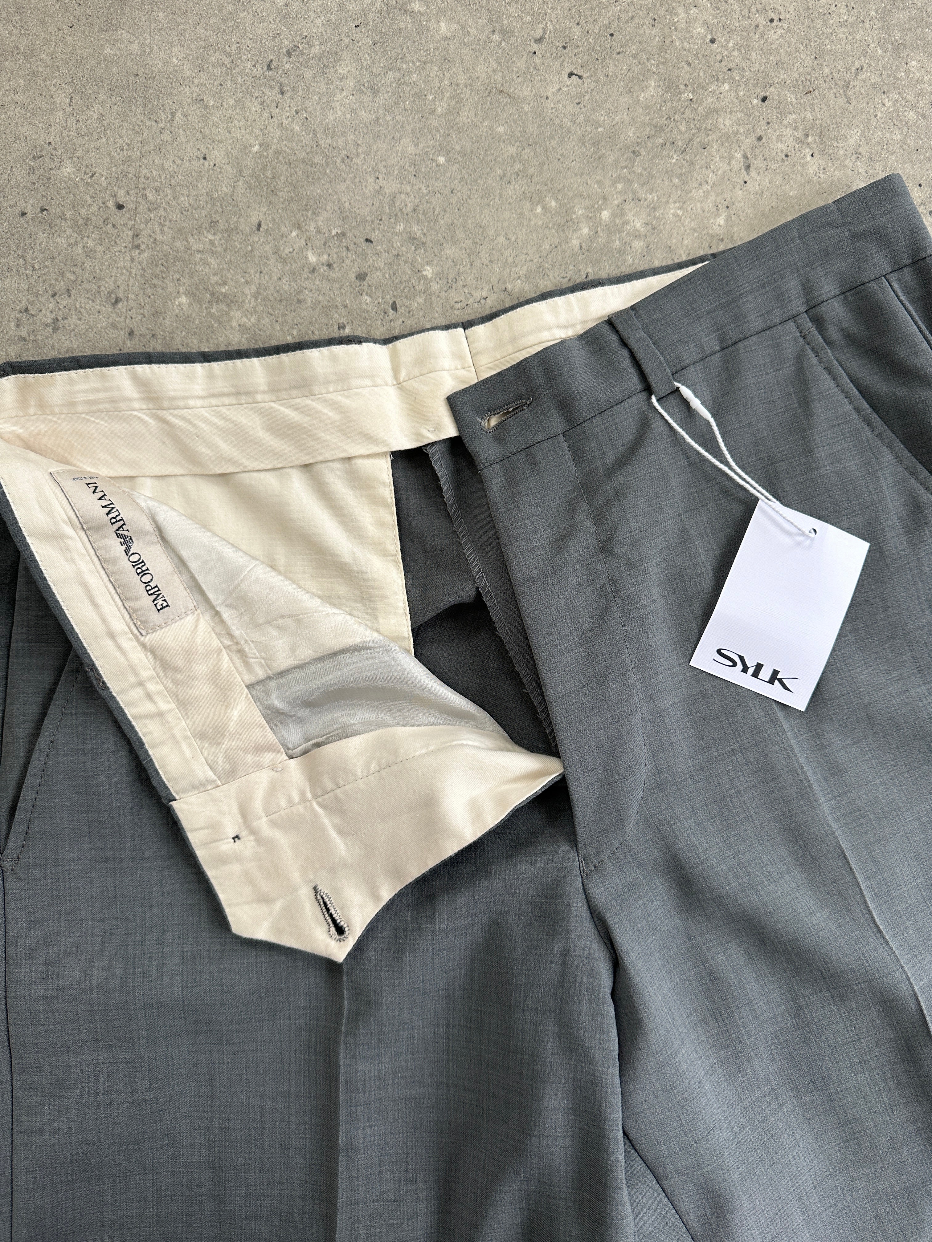 Emporio Armani high-waisted tailored wool trousers in black, featuring a sleek, structured fit and classic design.
