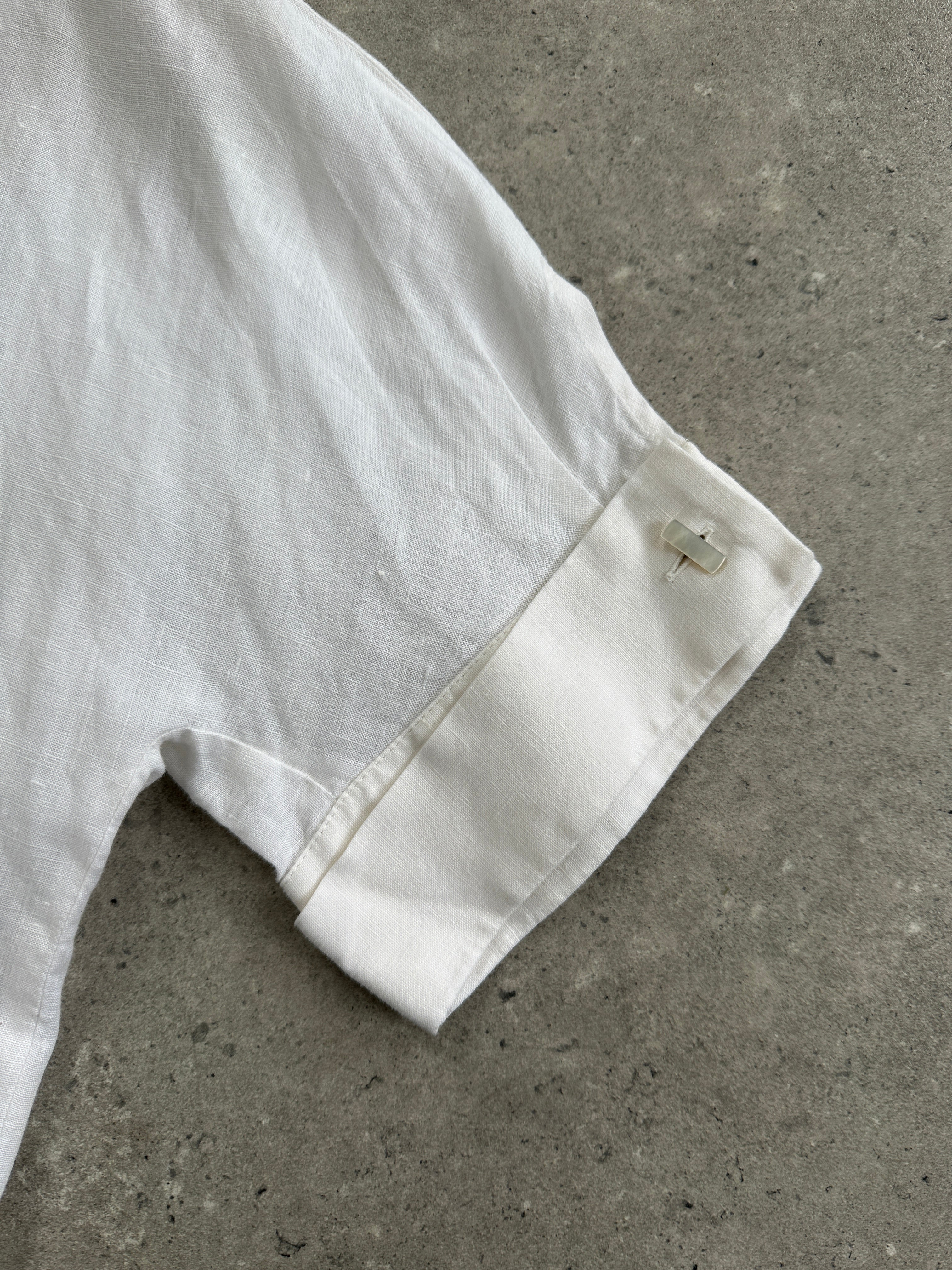 Max Mara pure linen short sleeve shirt in size S, lightweight and stylish, shown on a hanger with a neutral background.