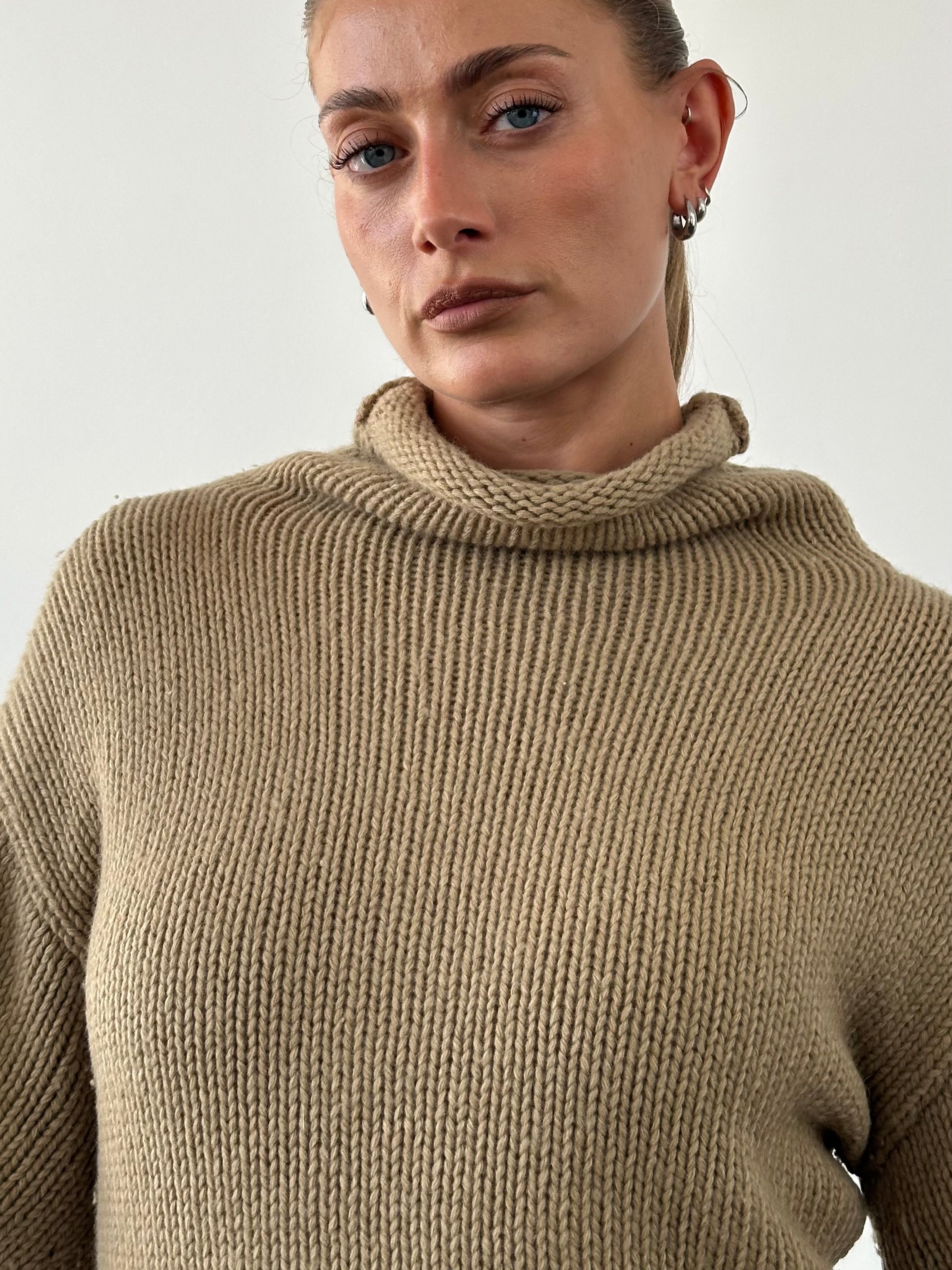 Armani Jeans wool roll neck jumper in size M, featuring a cozy knit with a classic design and ribbed collar.