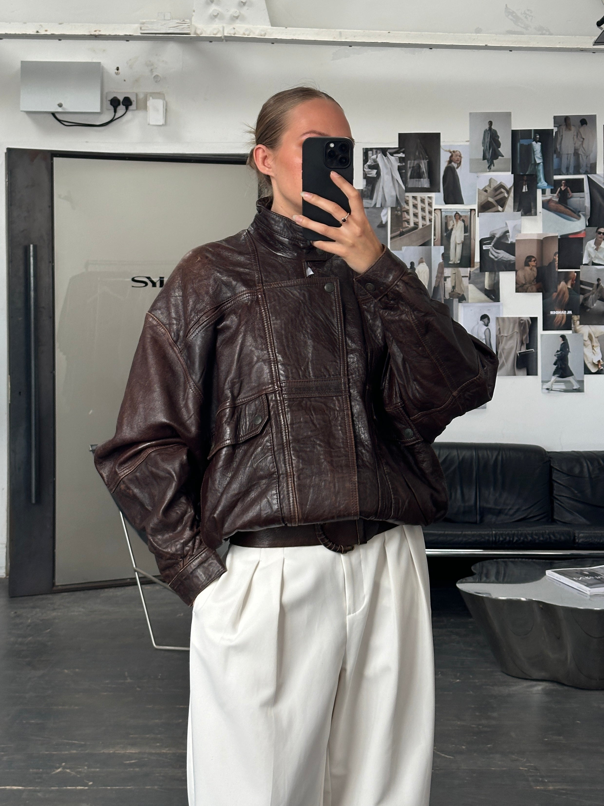 Vintage 1970s high neck moto leather bomber jacket in XL, featuring classic design and durable leather construction.