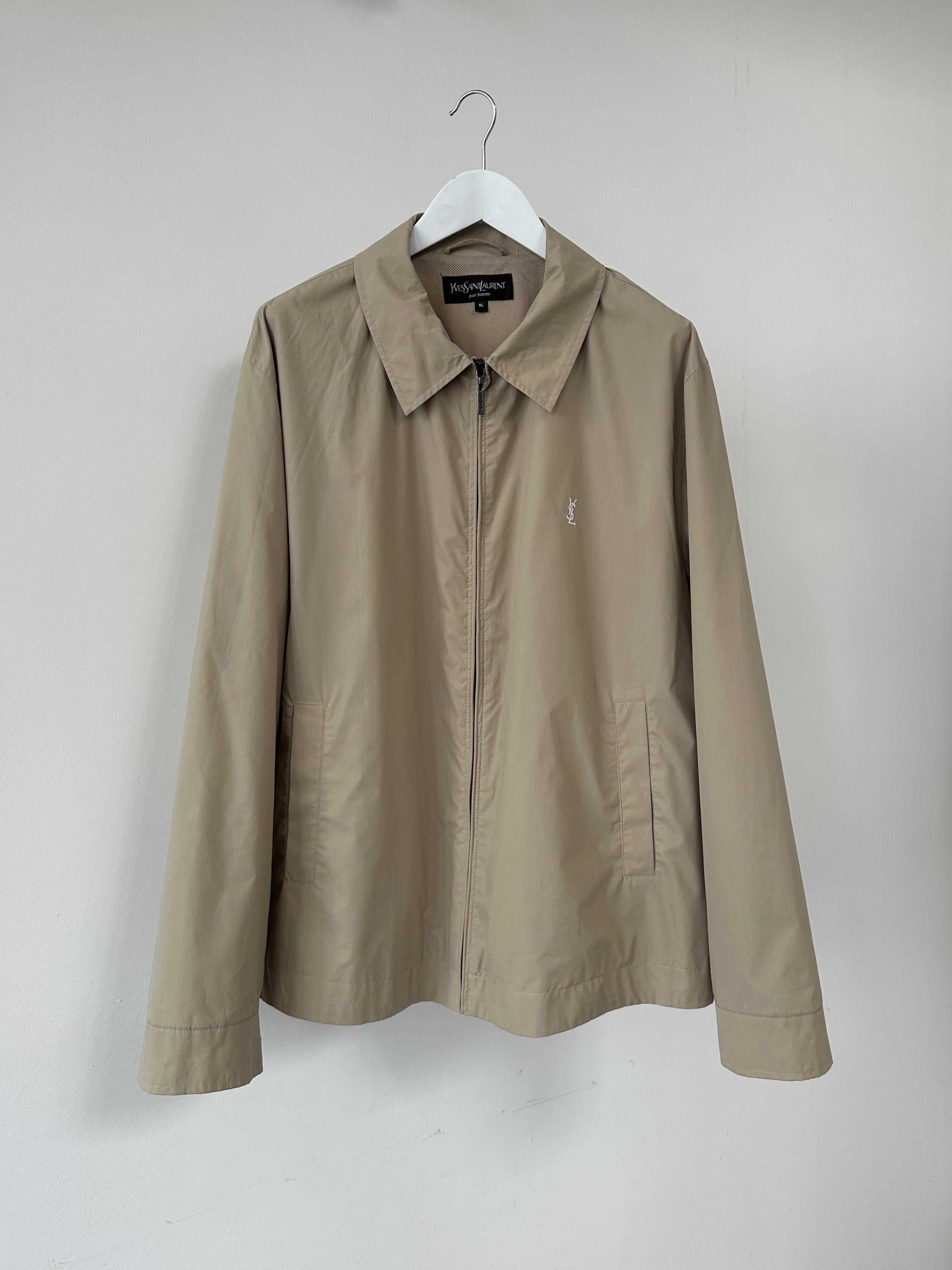 Yves Saint Laurent Harrington Logo Jacket in XL, black with YSL logo details, stylish designer jacket shown on a hanger.
